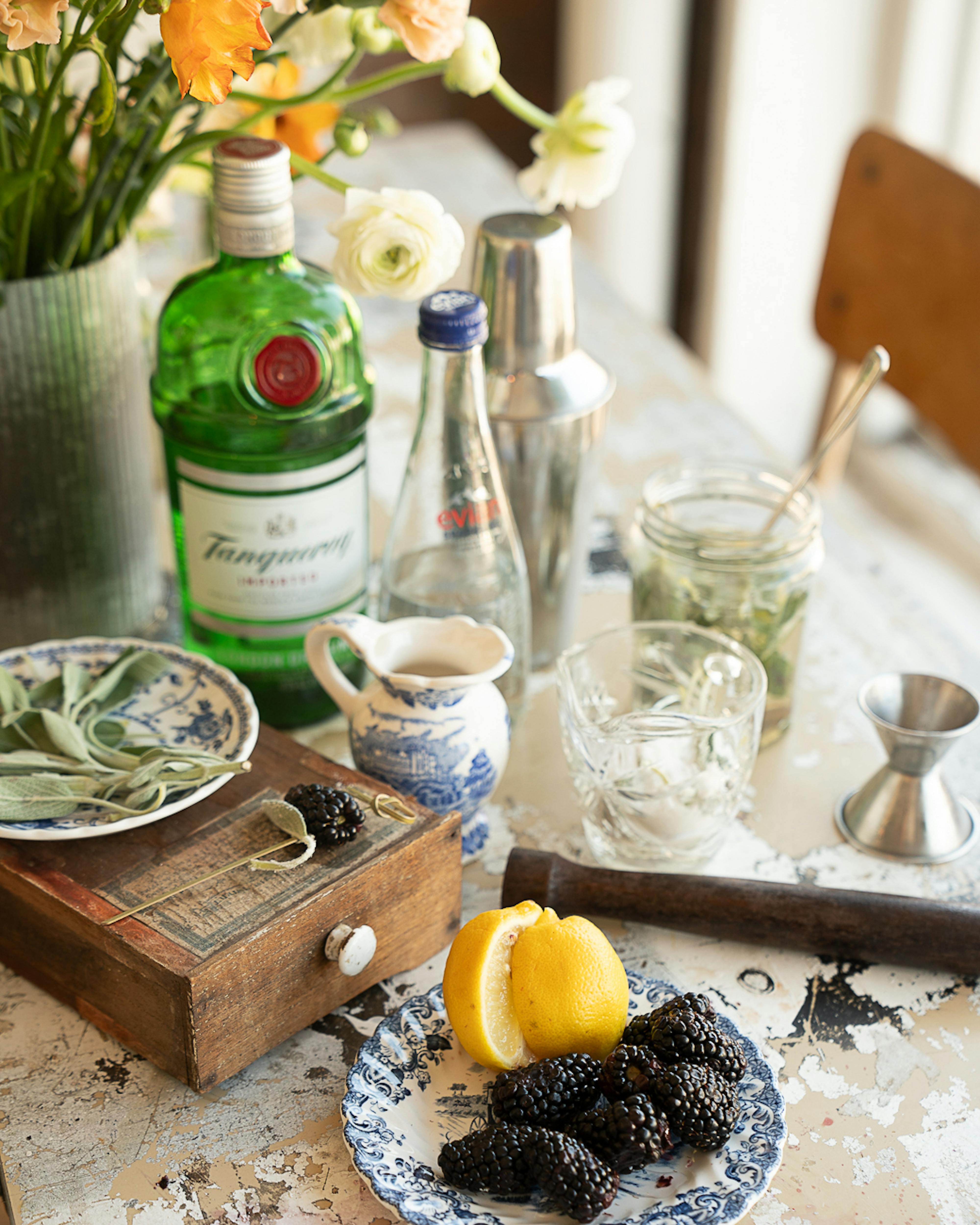 ingredients for blackberry sage smash on table 