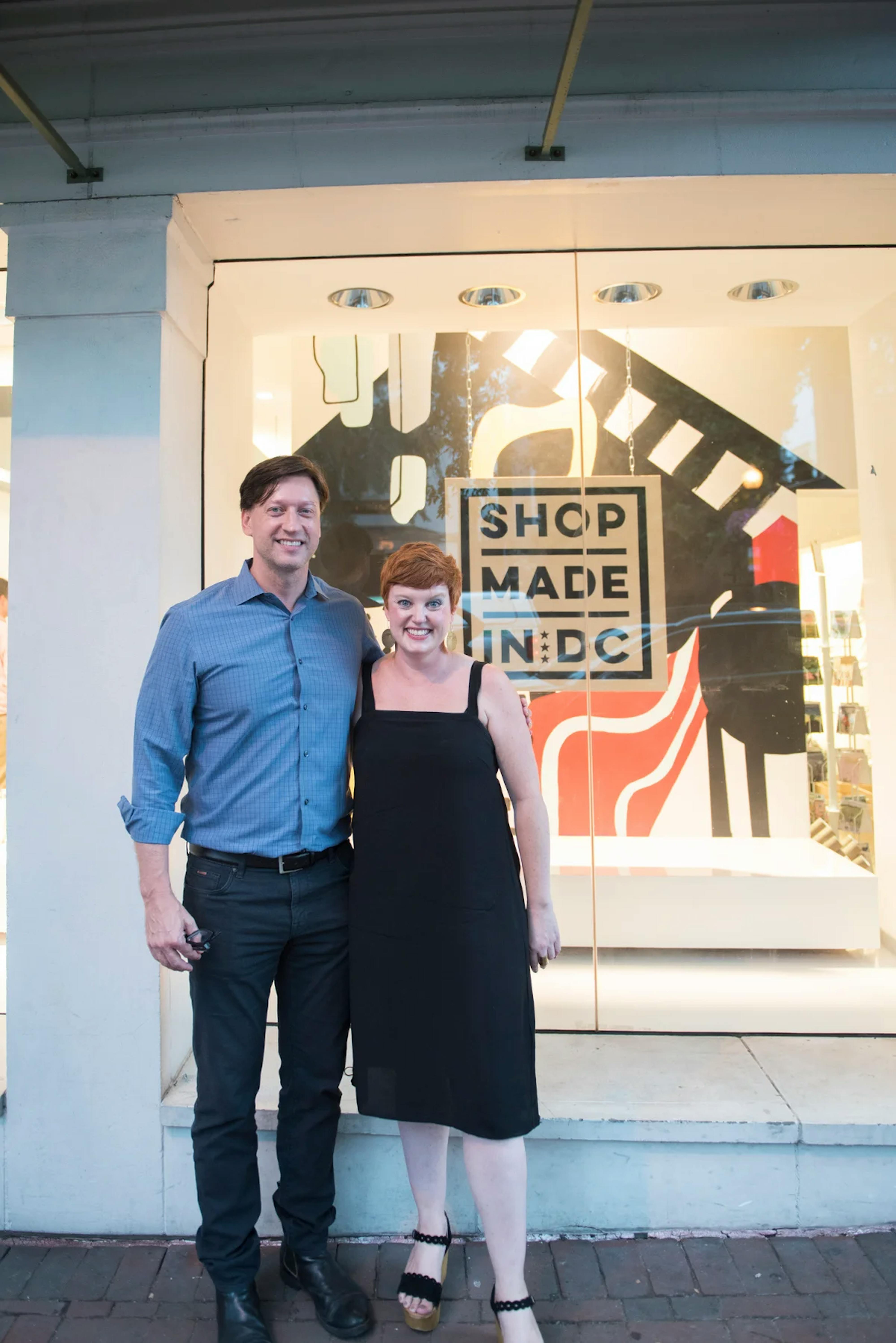 stacey and her cofounder standing in front of store