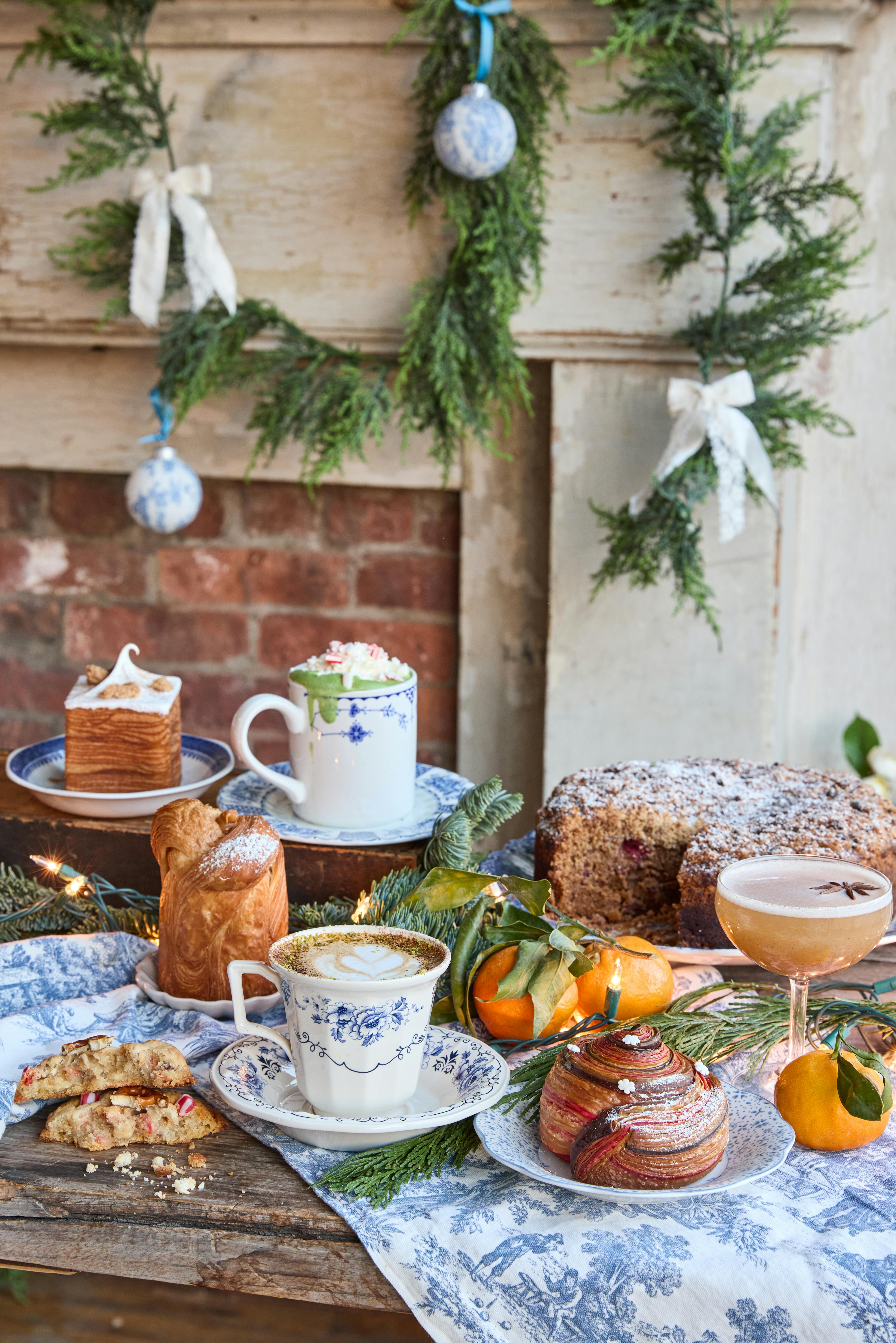 drinks in tea cups & pastries on tables