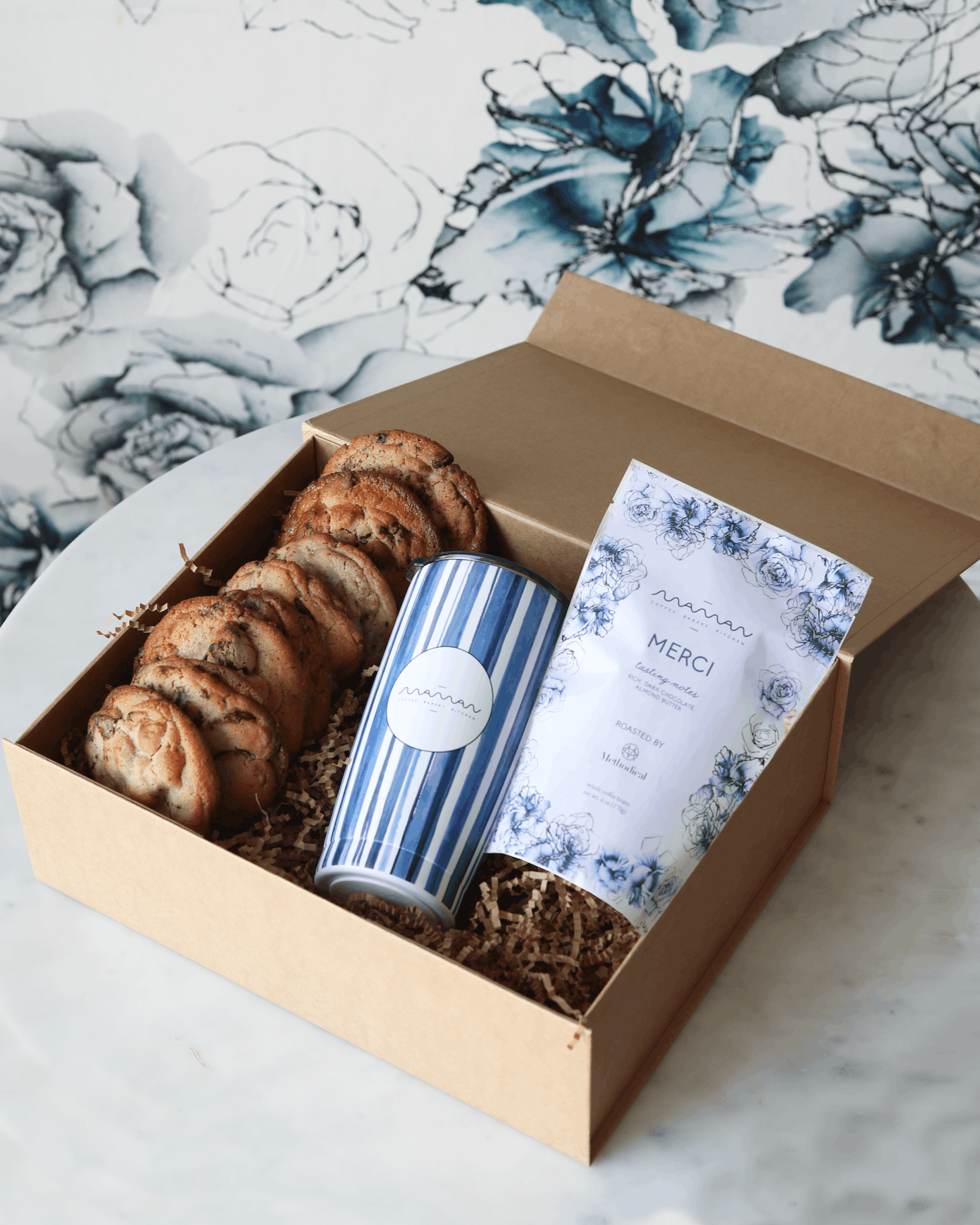 gift box with coffee, cookies, and a tumblr