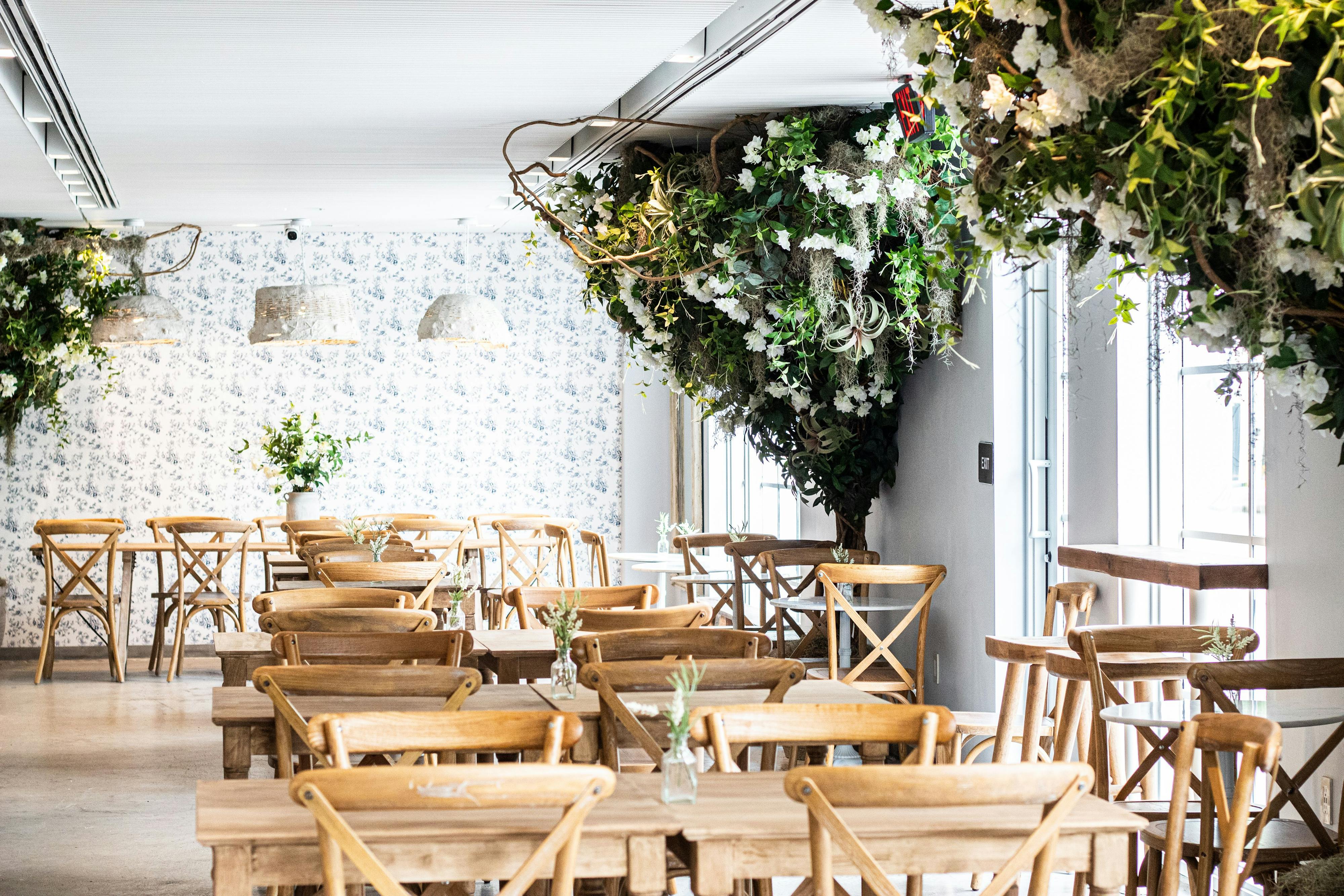 seating area with tree branches and lamps