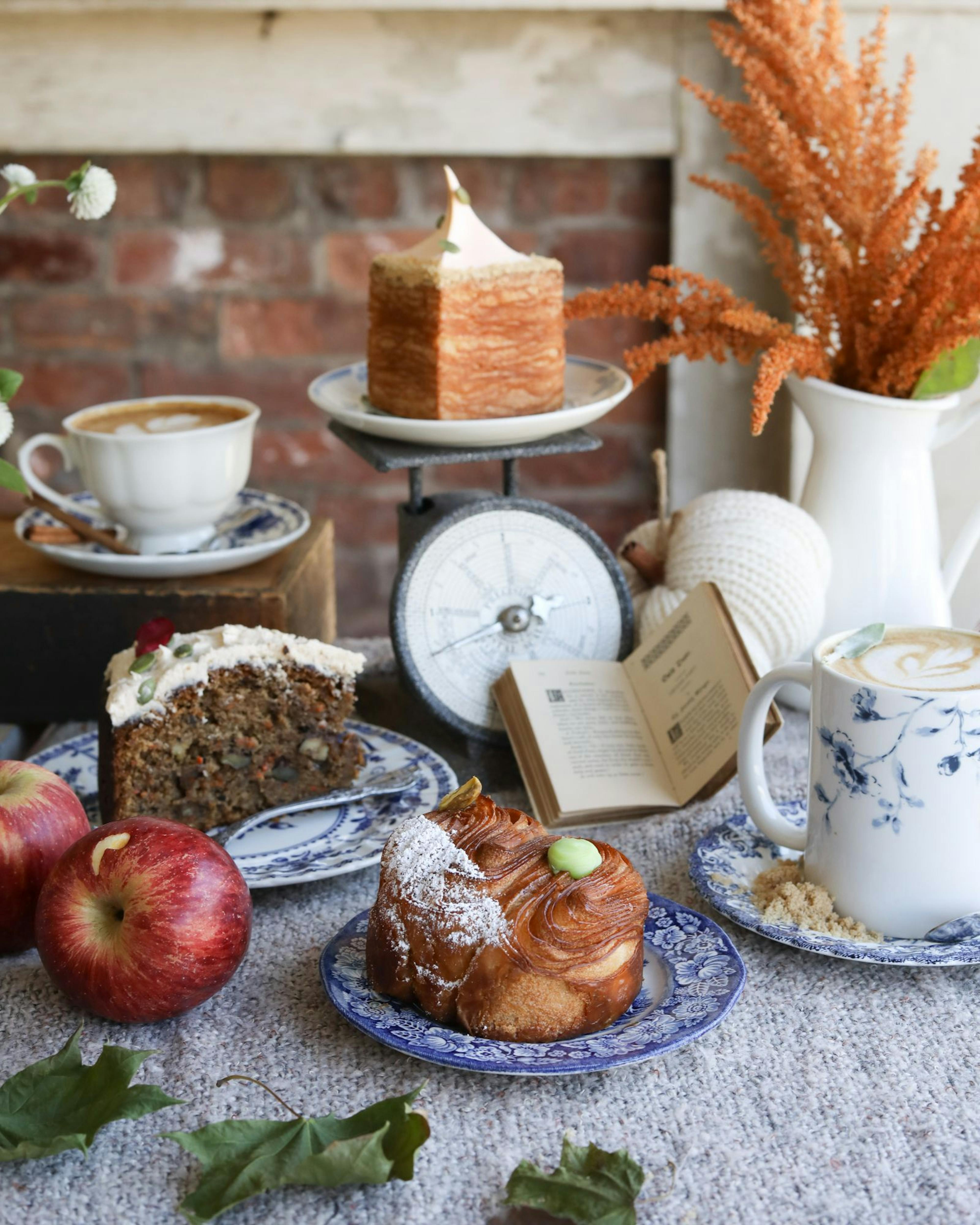 pastries and lattes with fall decor