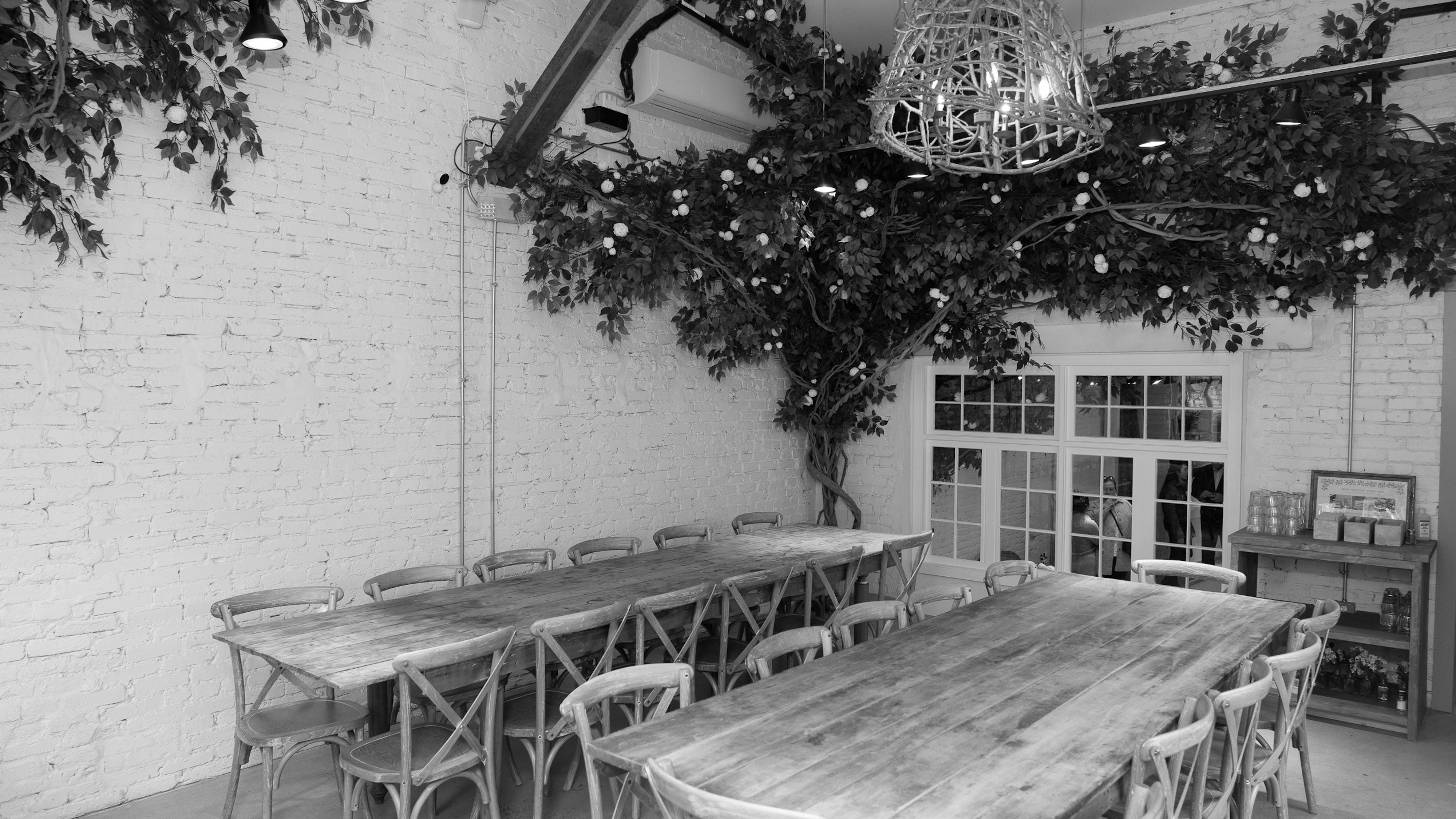 interior of store with tables and florals 