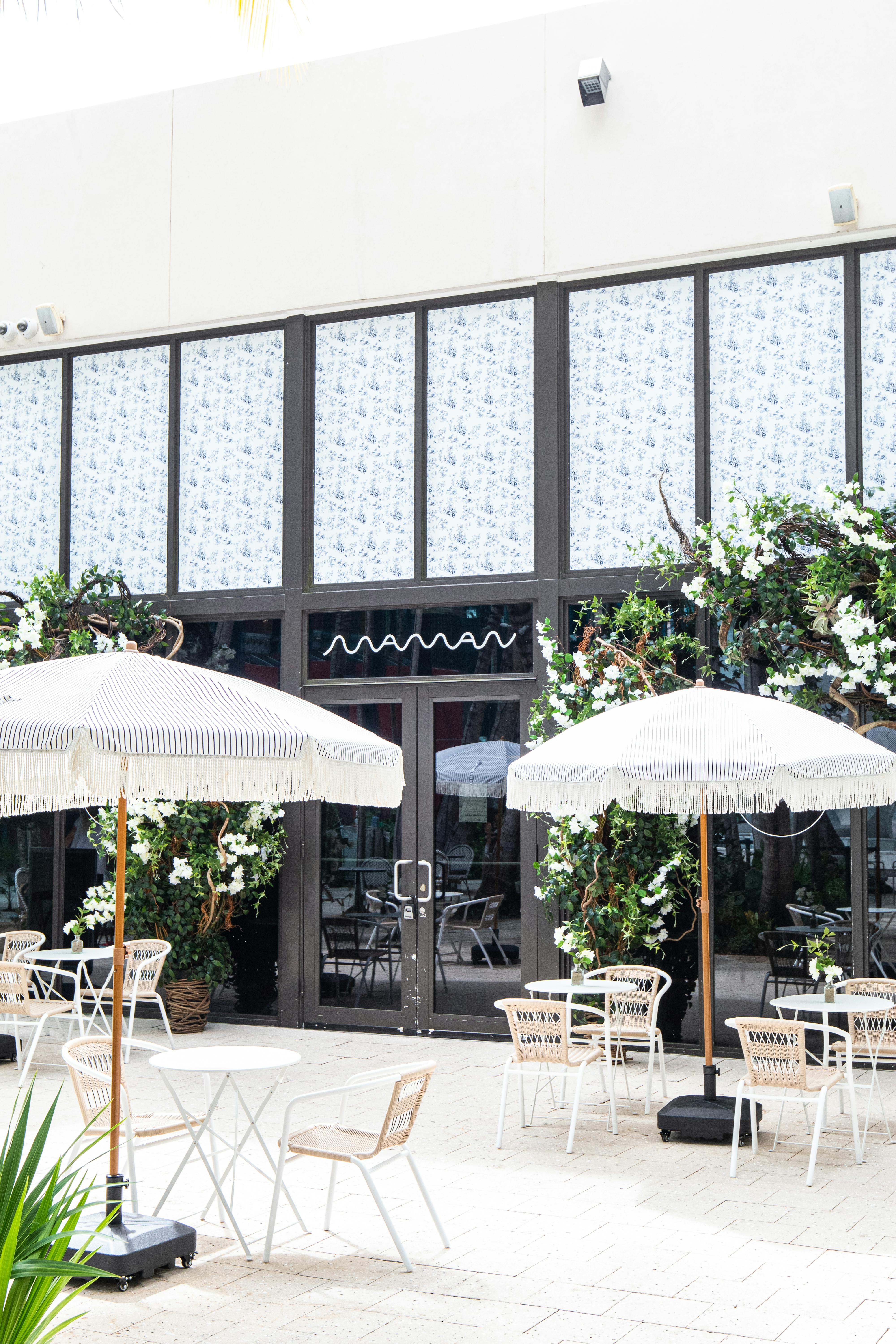 maman storefront with outdoor seating and umbrellas