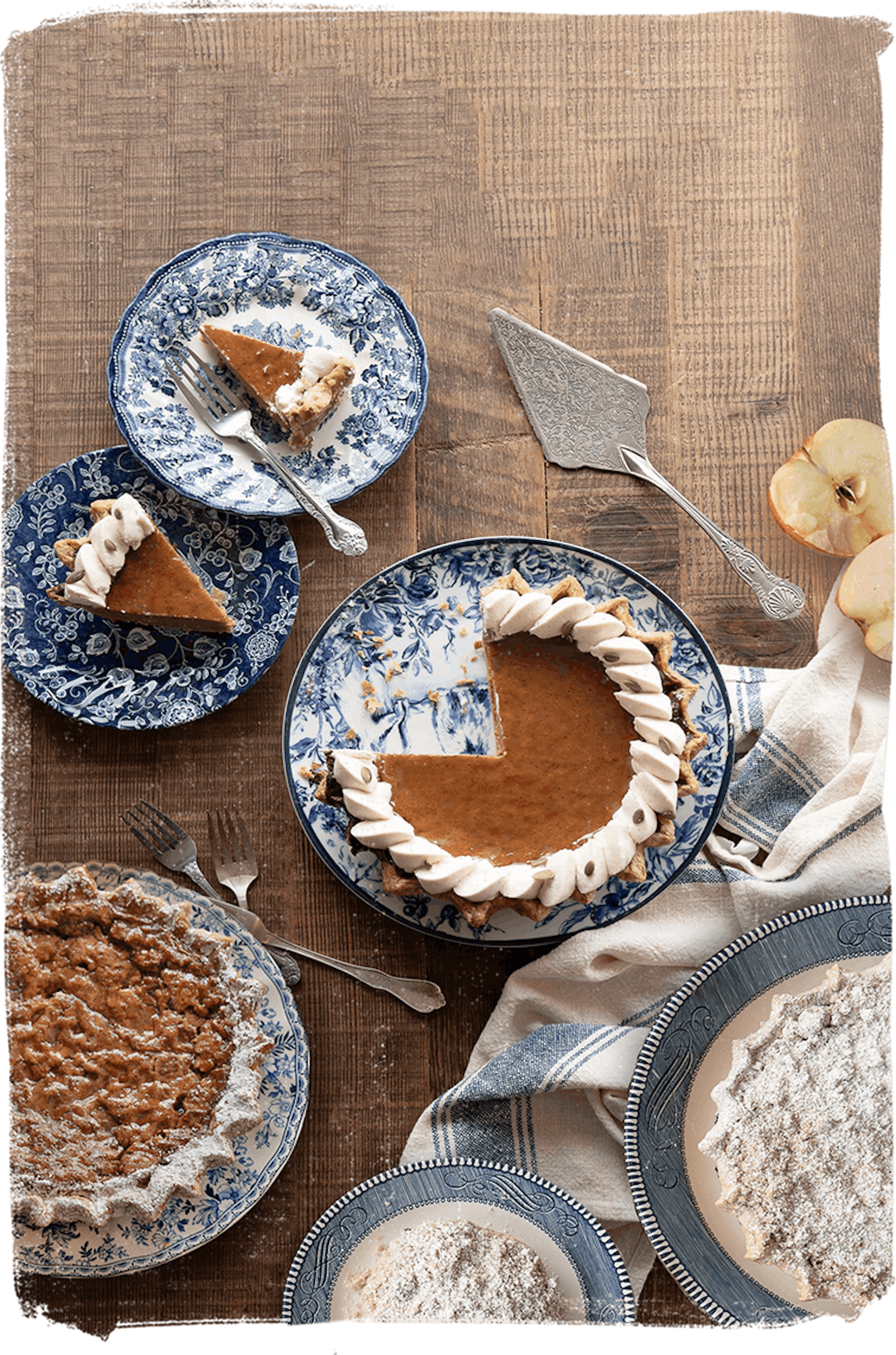 pumpkin and pecan pie spread on a table