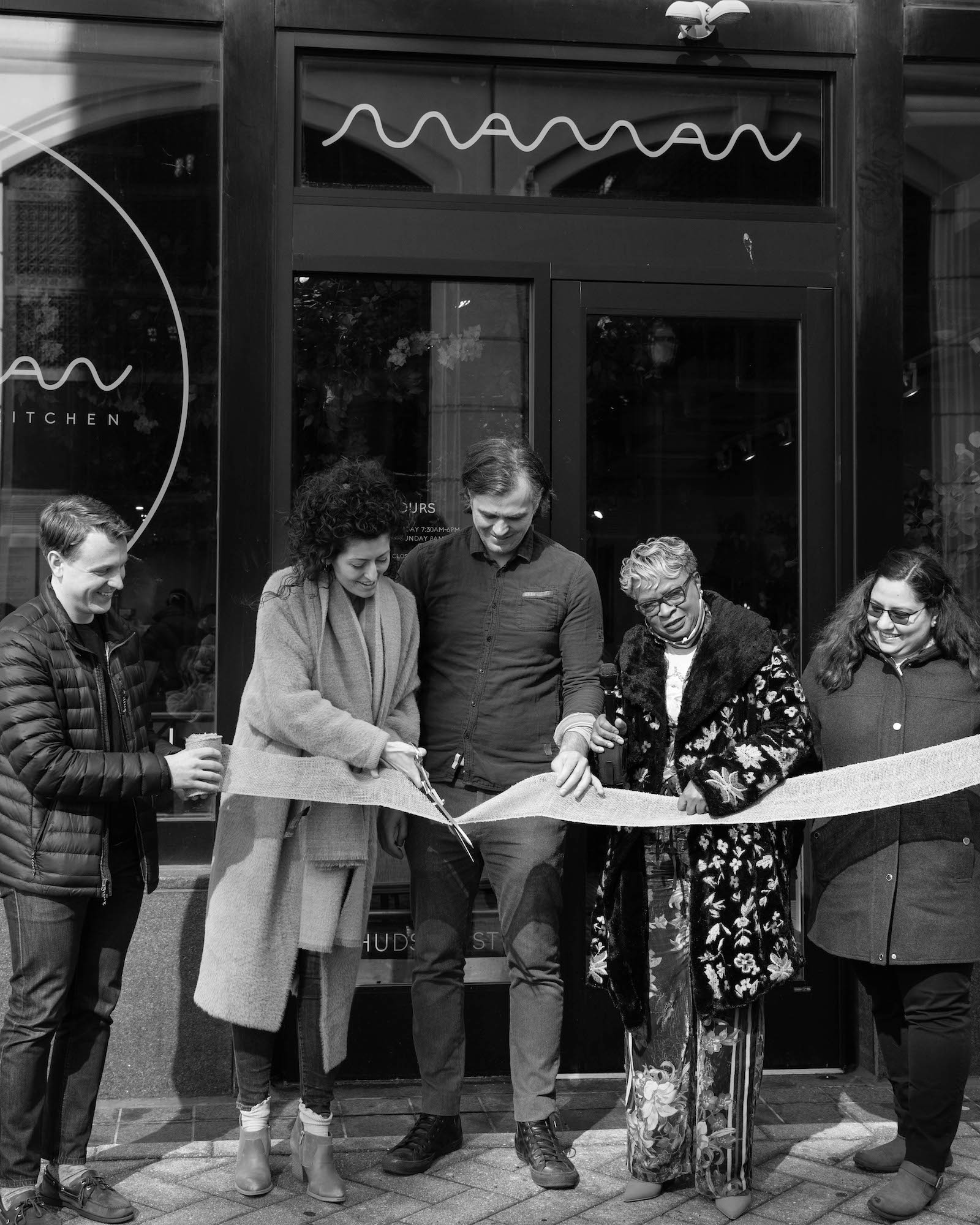 ribbon cutting at front door
