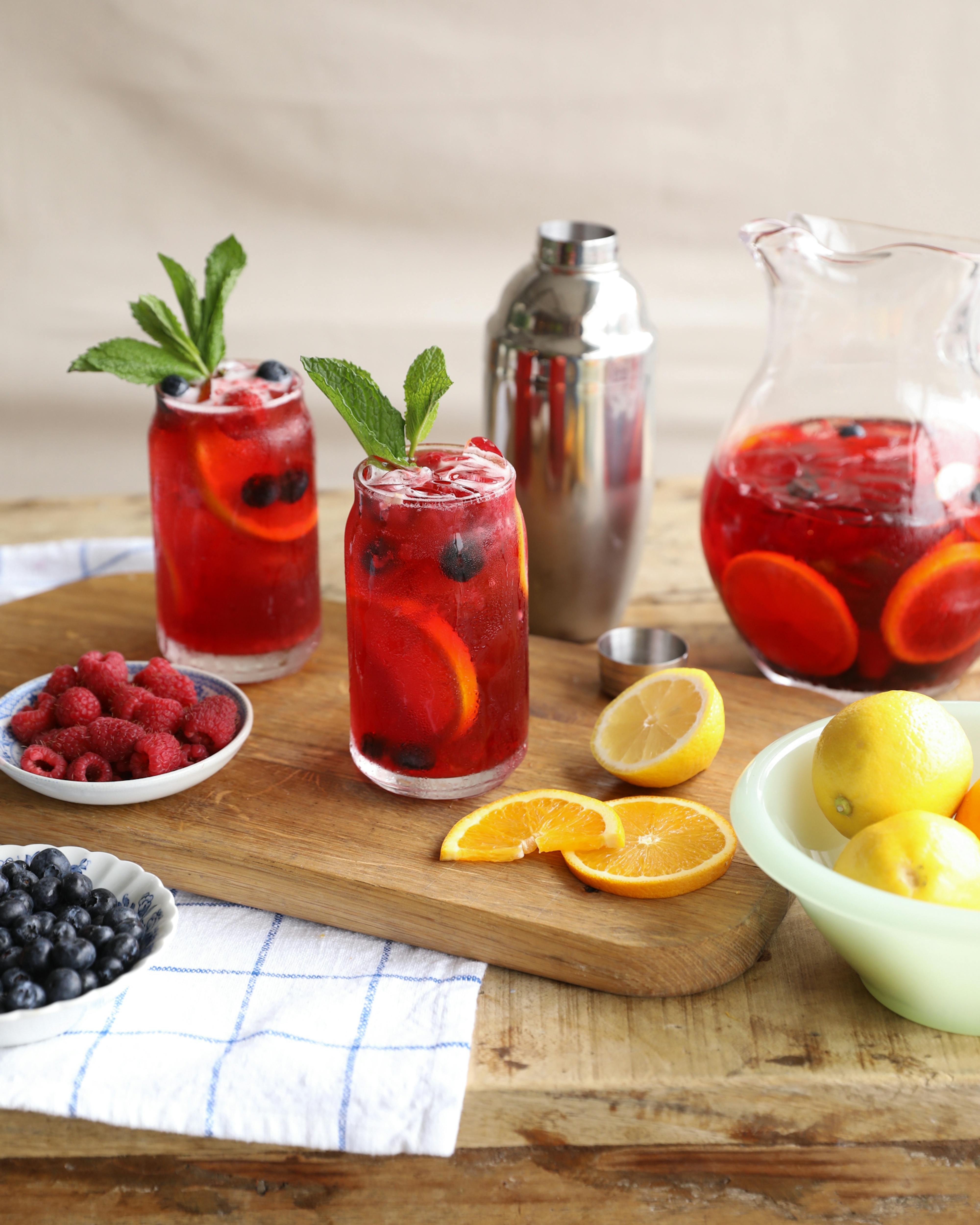 martha's red iced tea on table with fruit