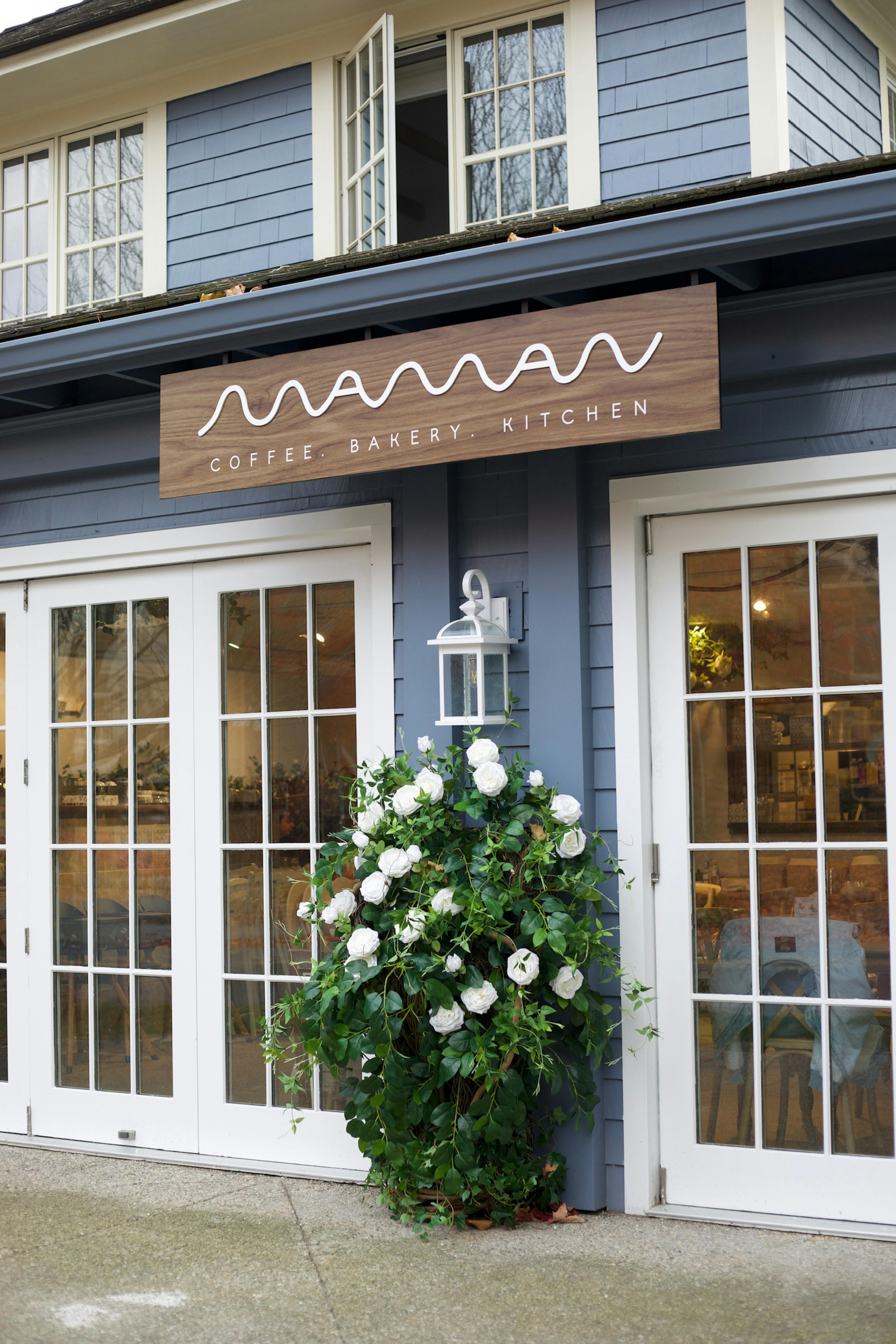 westport storefront with windows and flowers