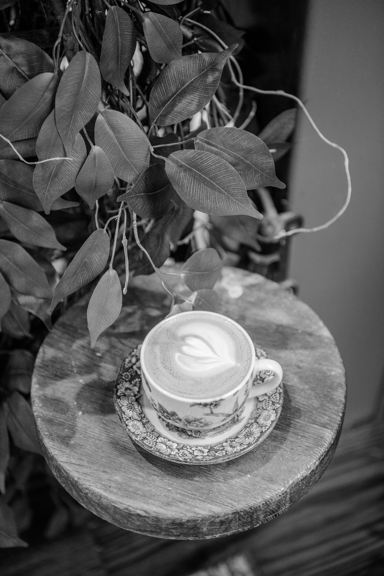 cappuccino on wooden stool
