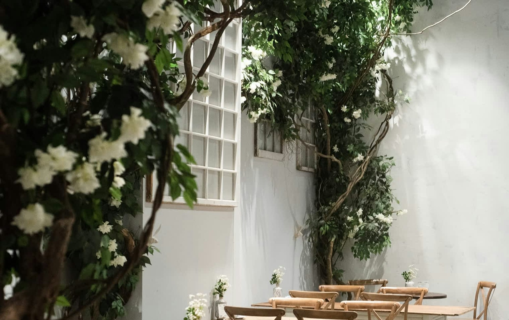 Bryant Park seating with florals facing back