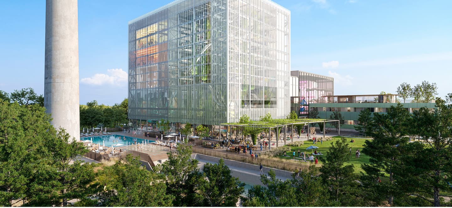 Dozens of people walking the grounds of a multi-story building and a large community pool all surrounded by manicured lawns.