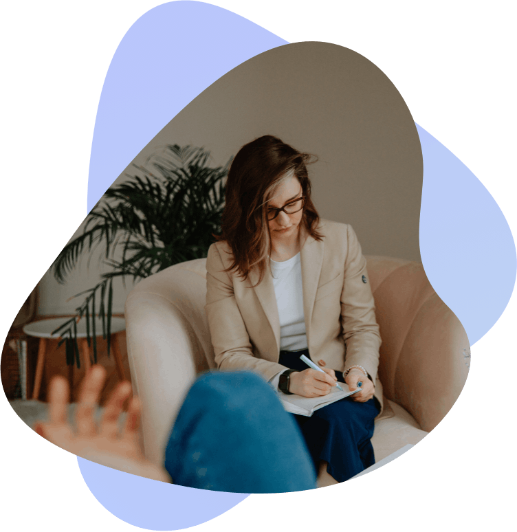woman taking notes