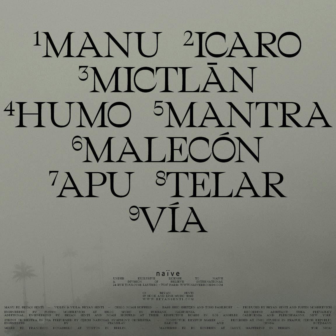 The back cover of the Manu album, showing the tracklist and fine print over a foggy hillside.
