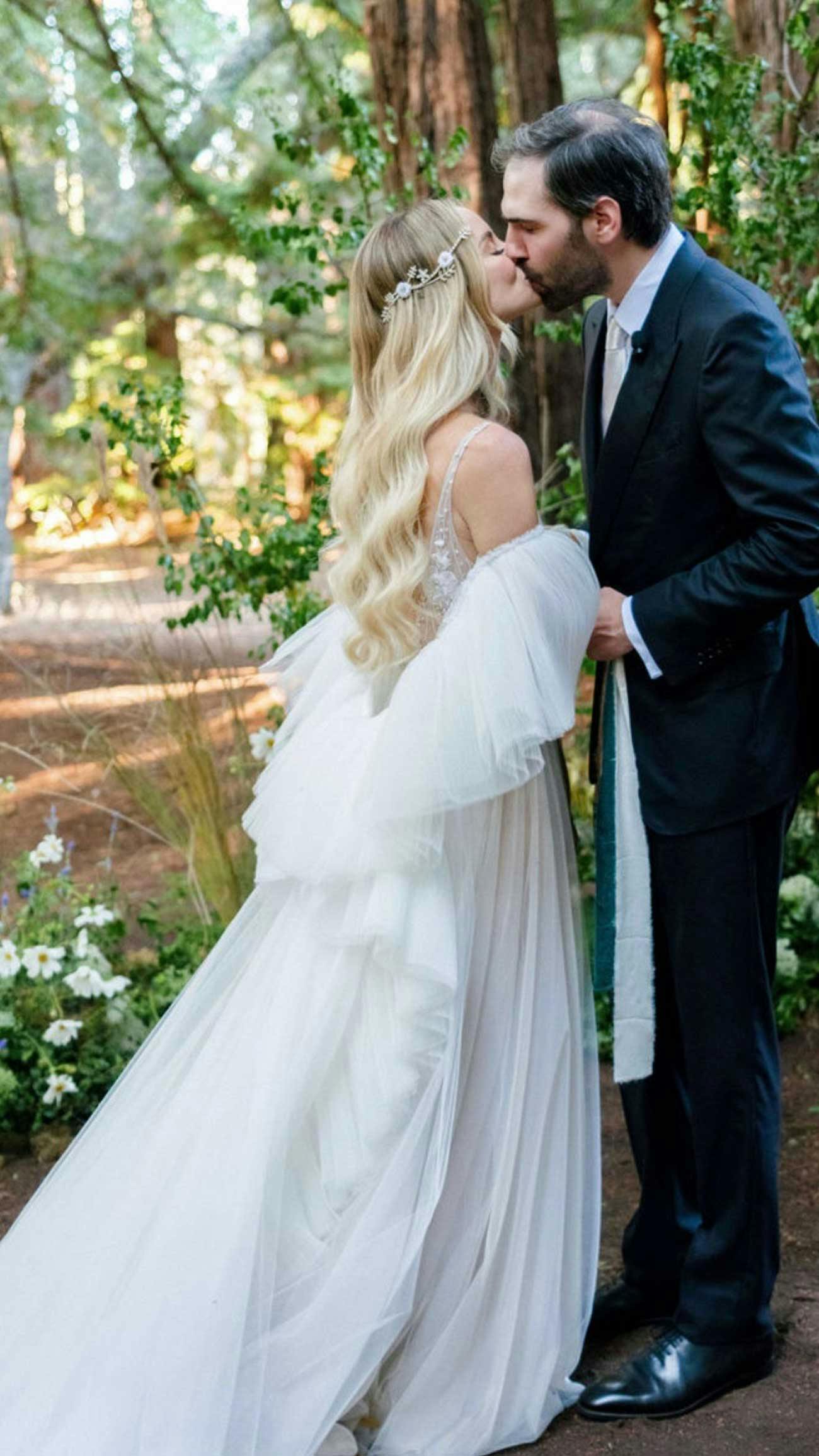 Couple kissing on their wedding day