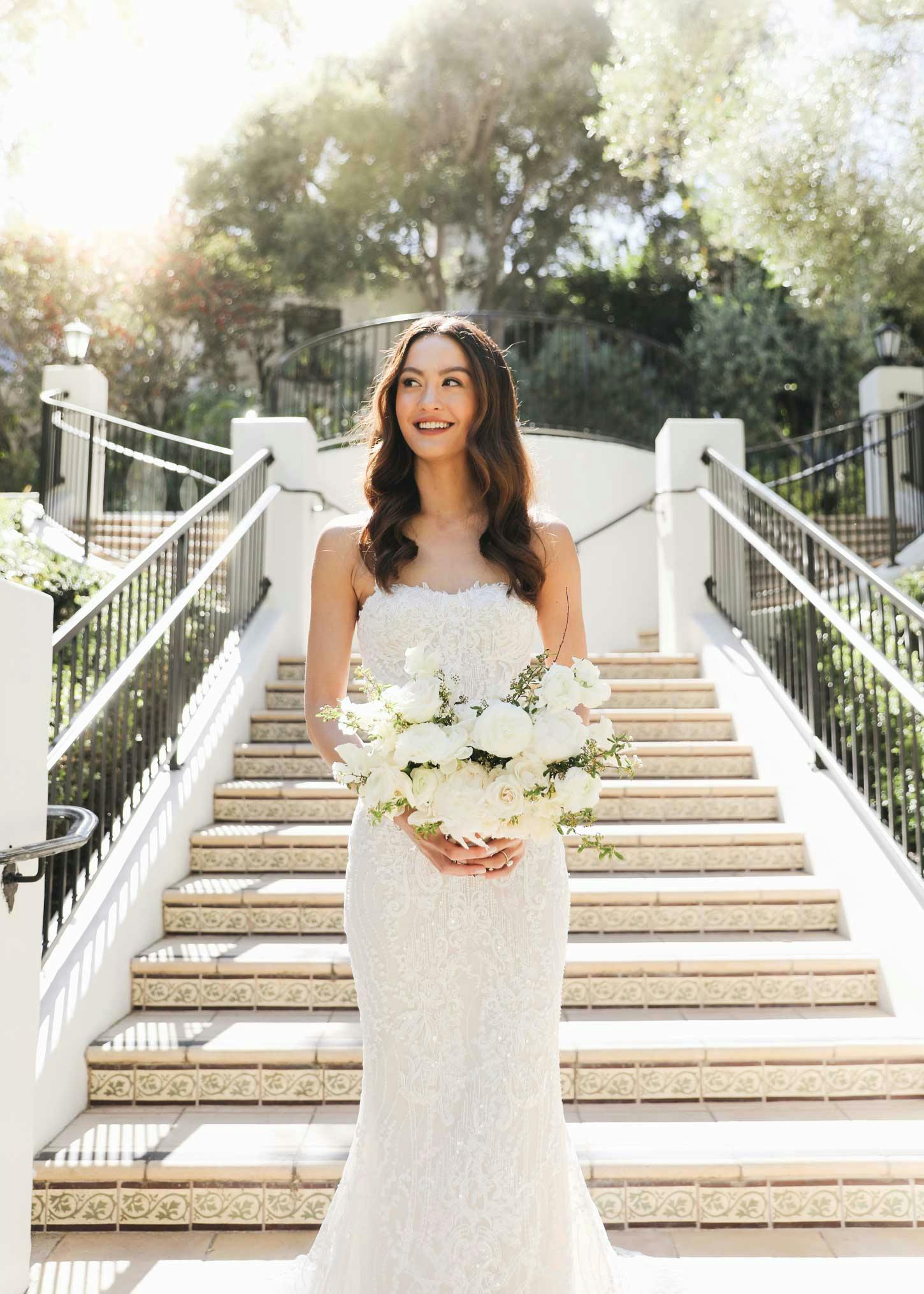 Bride holding flower bouquet