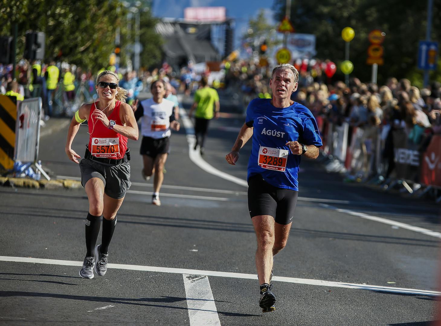Participants finishing the race in street Lækjargata