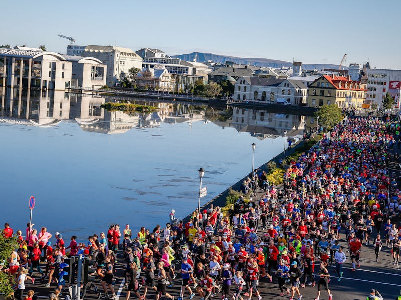 Runners by the pond