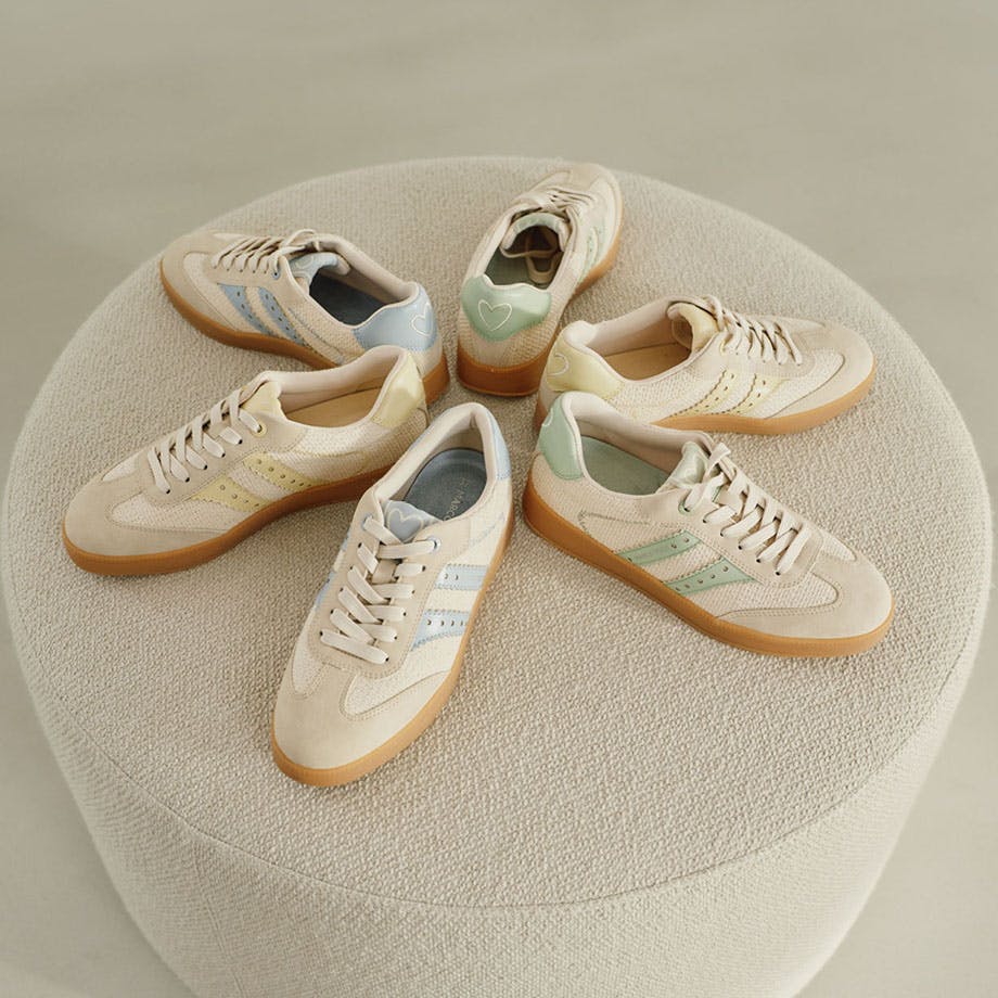 MARCO TOZZI trainers, arranged in a flower shape on a round platform