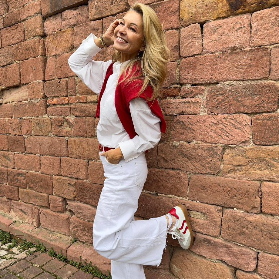 Sneakers with red stripes