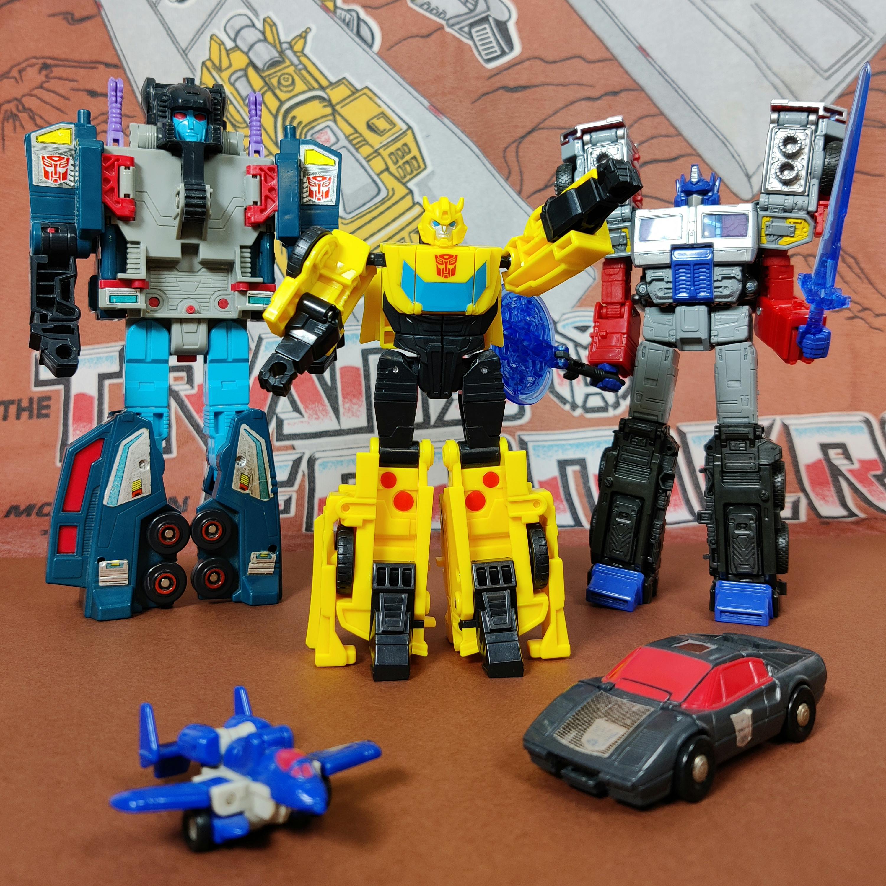 A group photo of Transformers toys