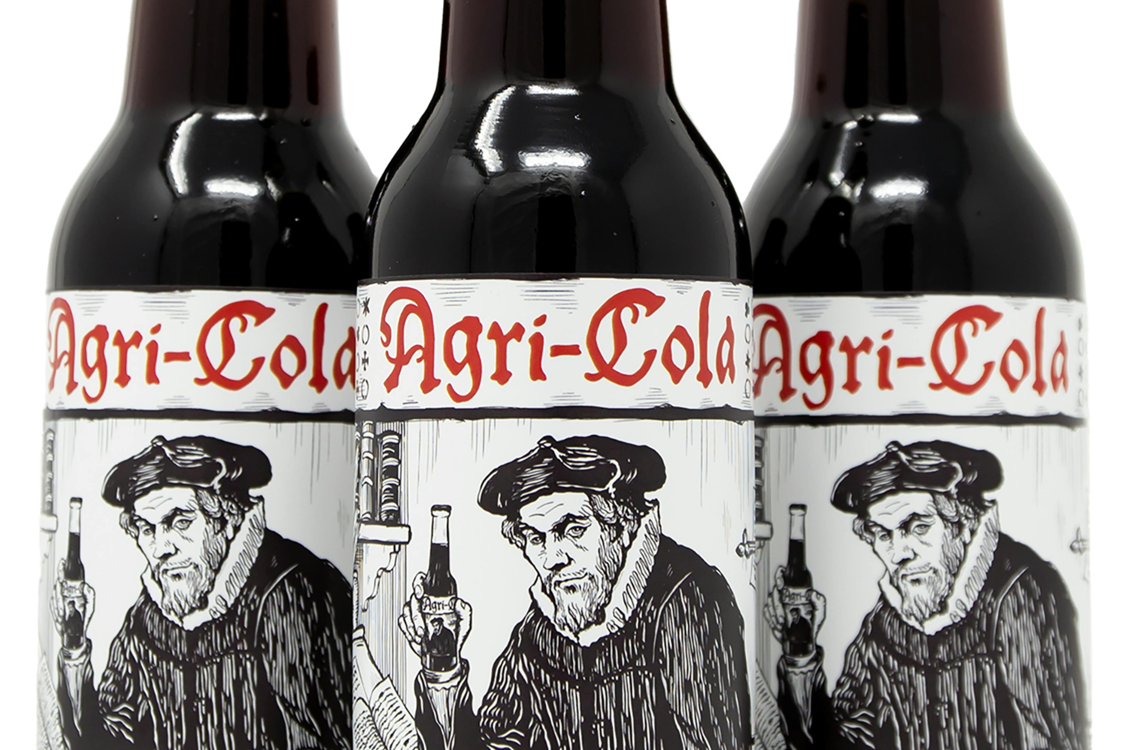 Three Agri-Cola bottles