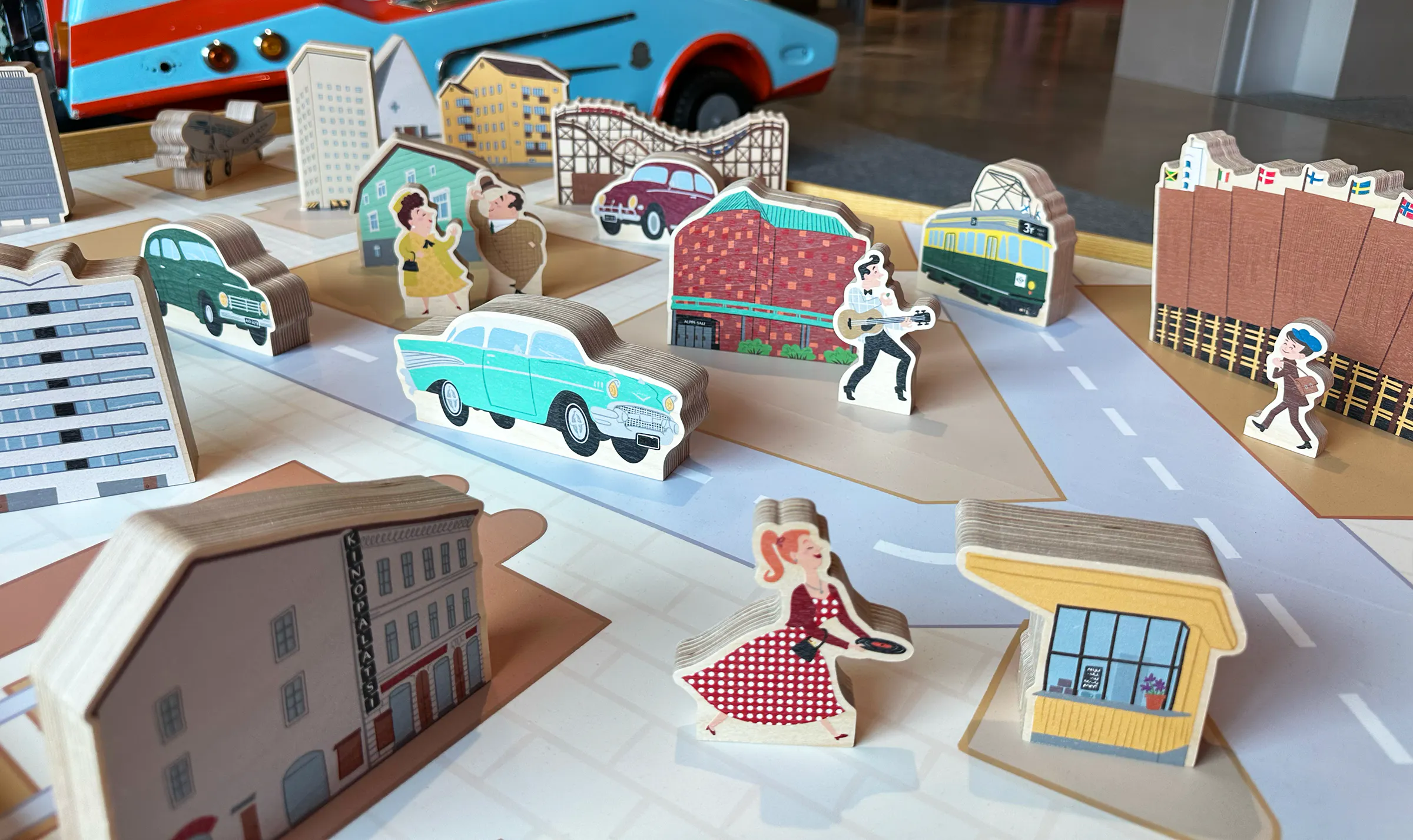 1950's themed play station with wooden farm and city themed toys