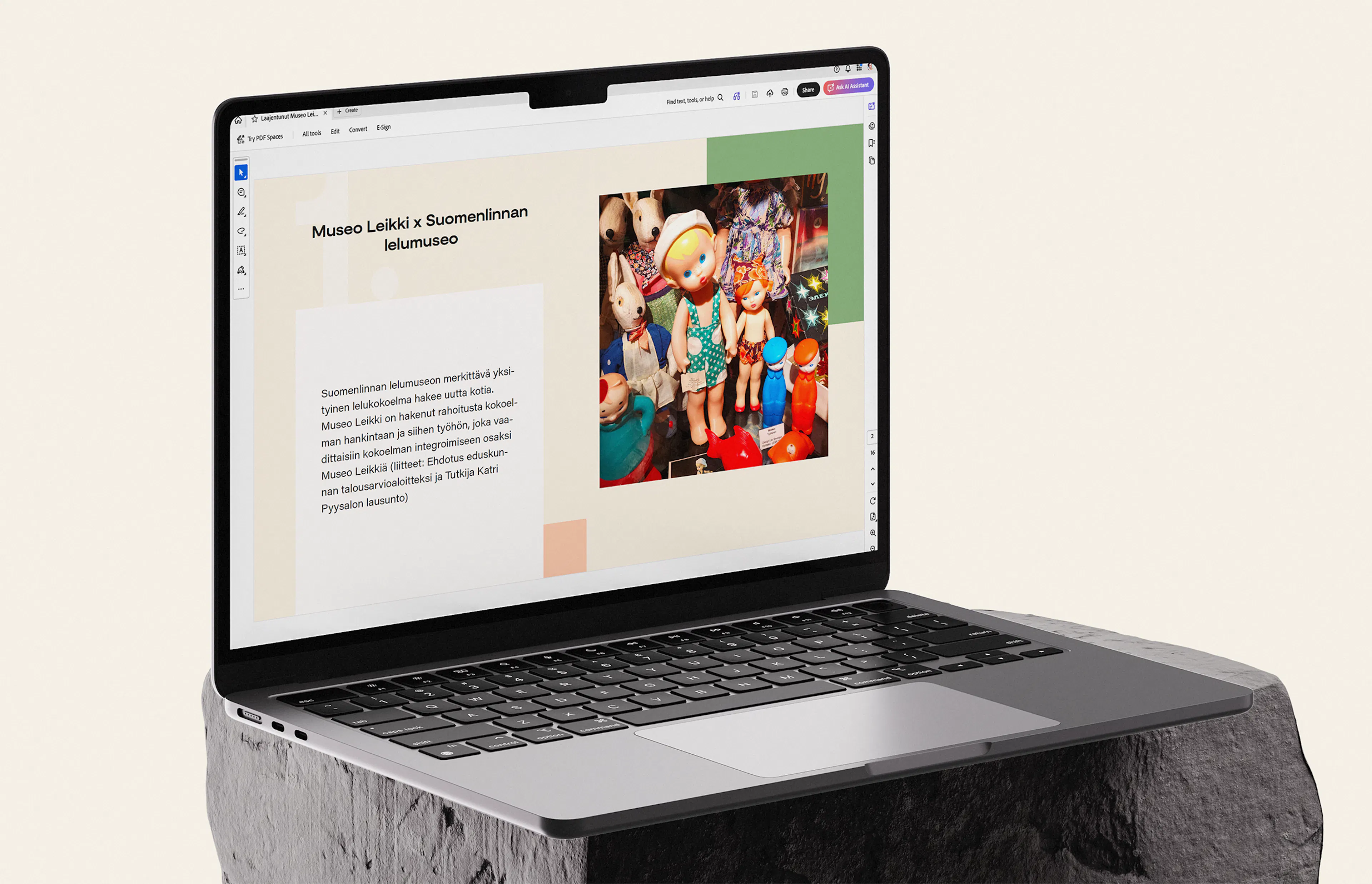 Examples of graphic design for Museo Leikki on a Macbook