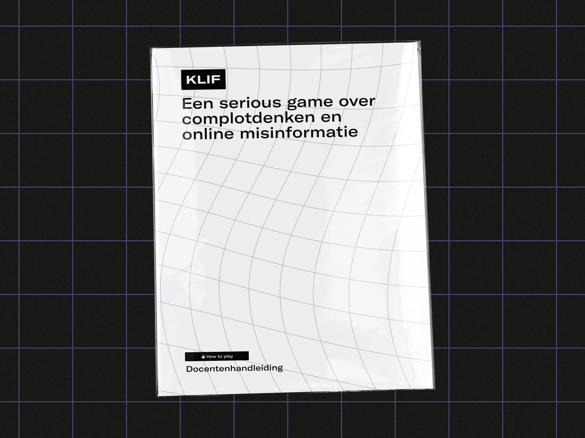 A paper manual inside plastic on a dark background. The front cover of the manual is visible and says (translated from Dutch) 'A serious game about conspiracy thinking and online misinformation, teachers manual'.