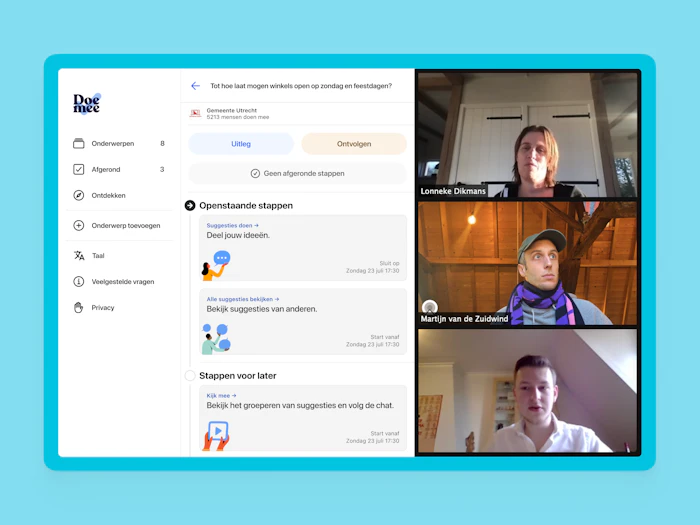 A screenshot of a usability test: three people are visible next to an interface.