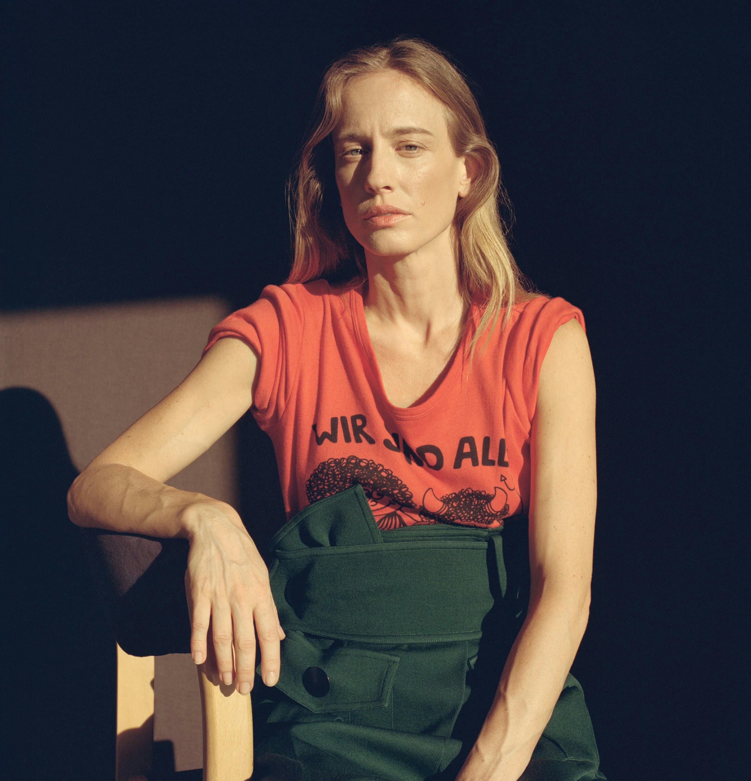 Marton Perlaki portrait with dark backdrop and natural light