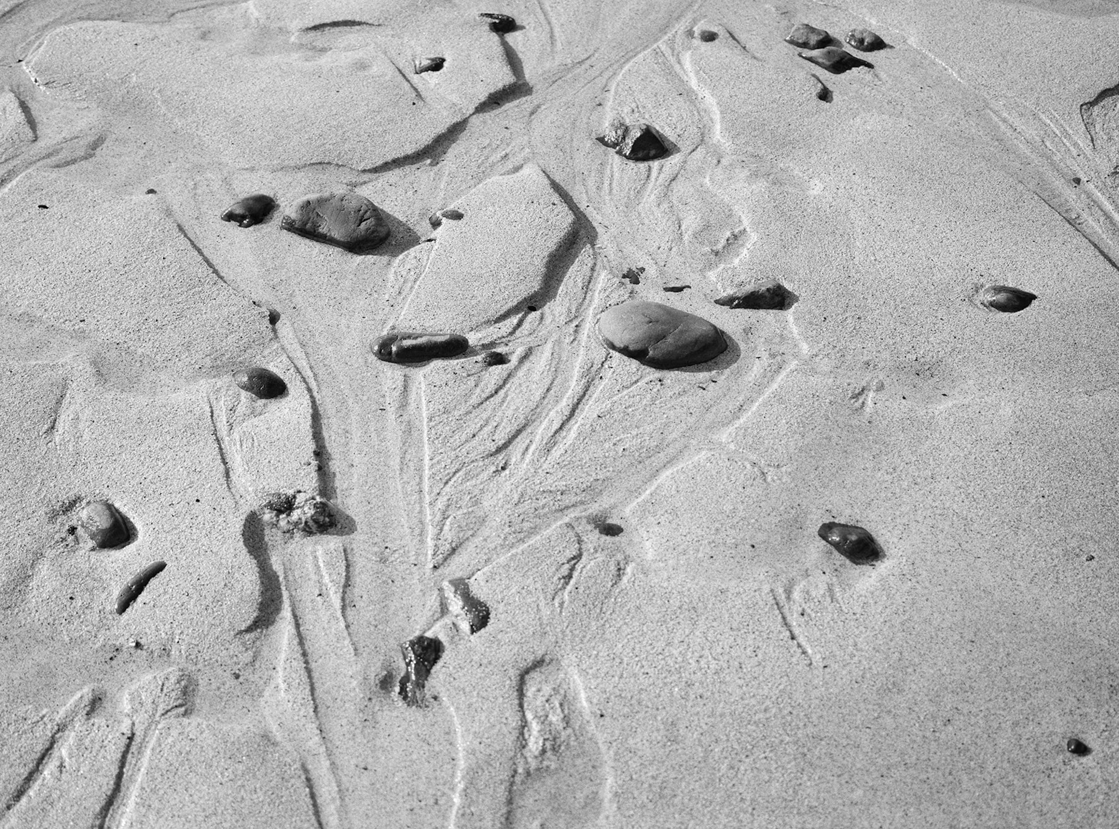 small rocks in the sand