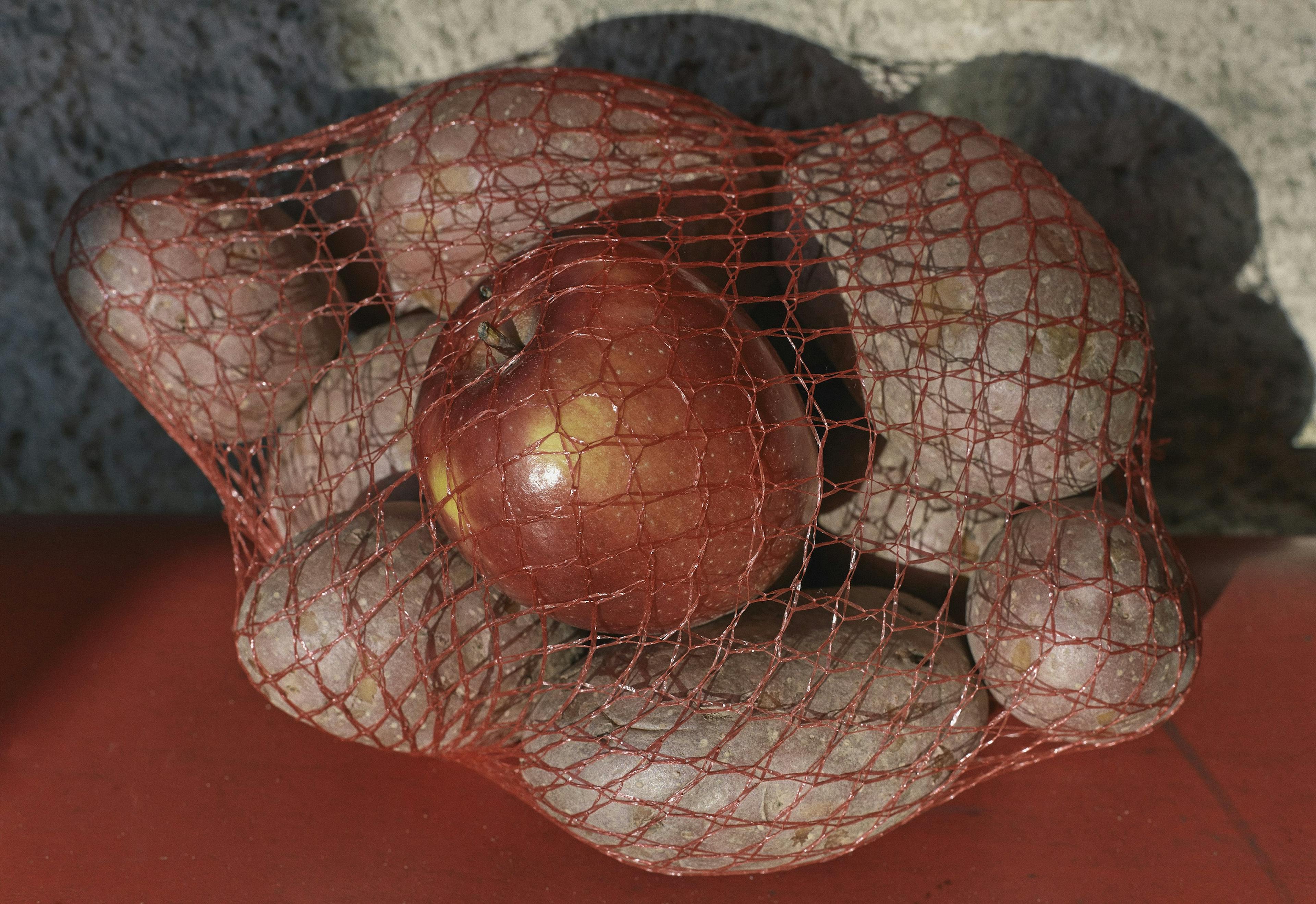 apples and potatoes in a bag