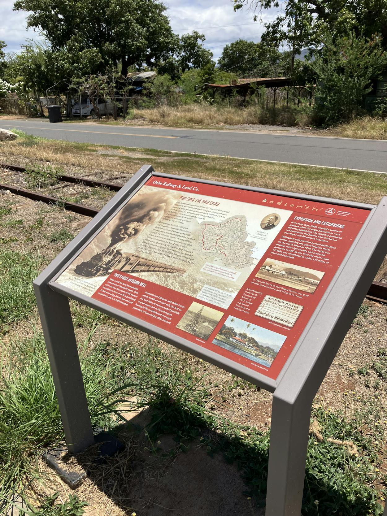 Image of sign facing railroad, completed by MASON