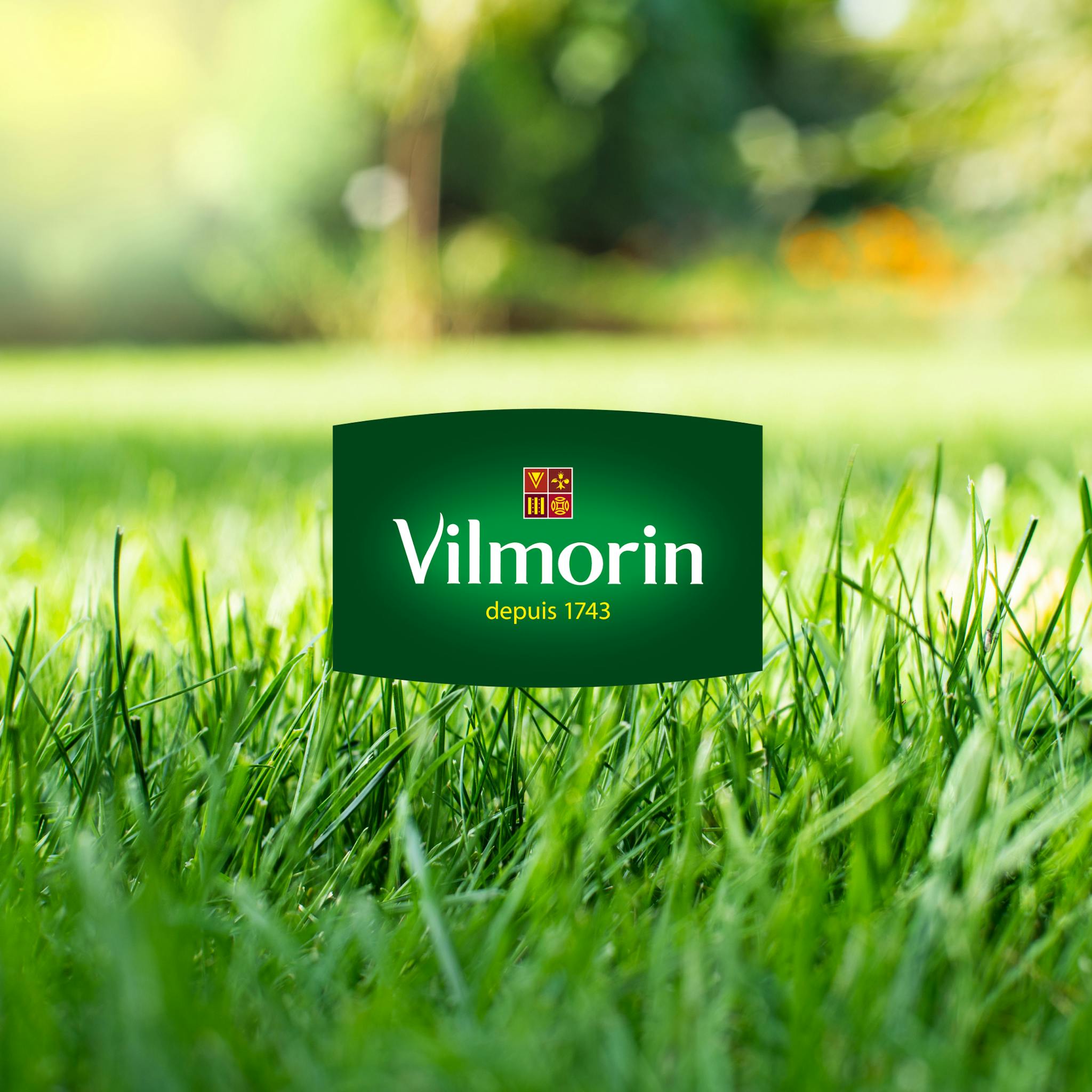 Logo de Vilmorin par dessus l'image d'herbe