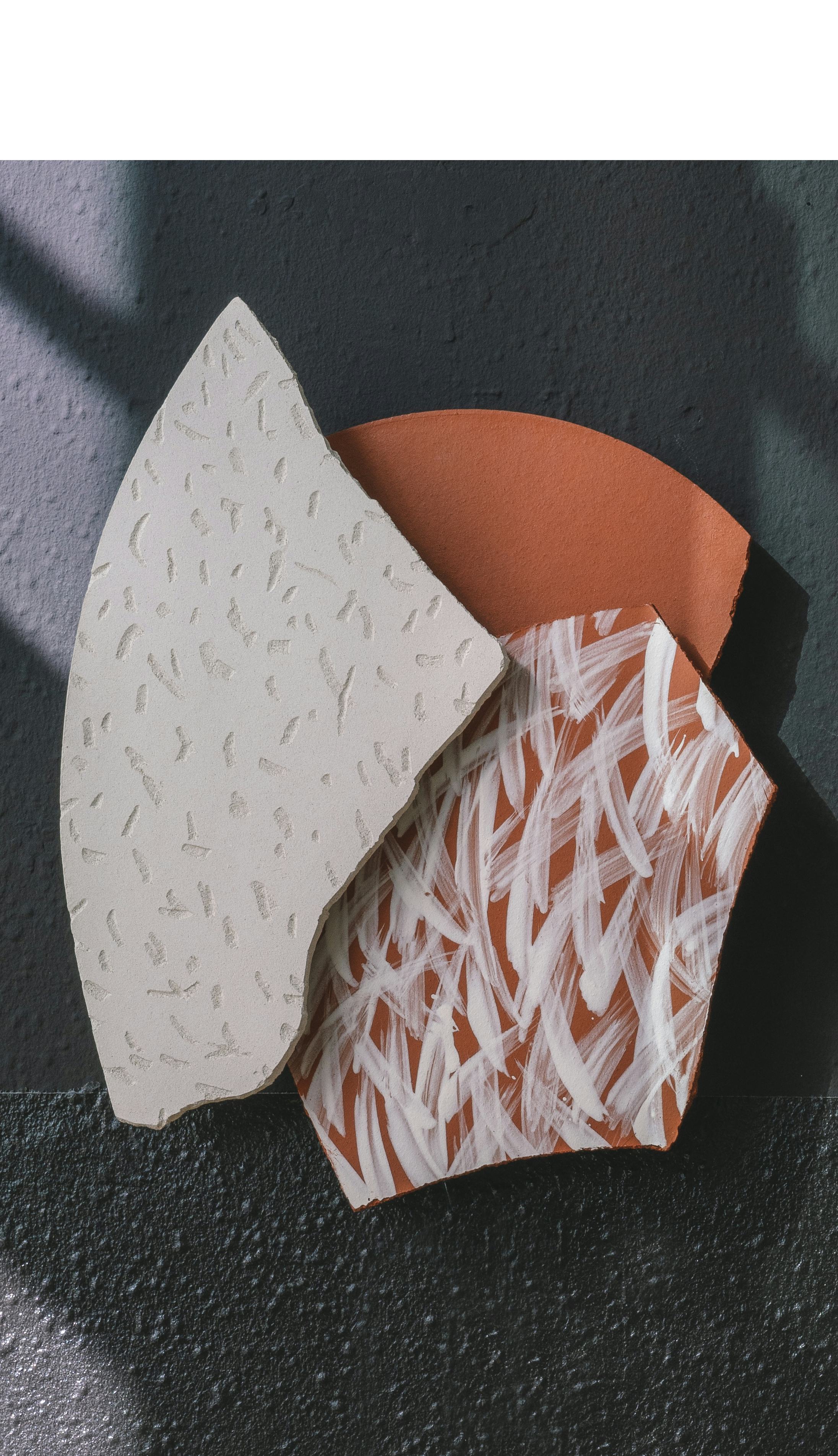 Wall hung light with three elements