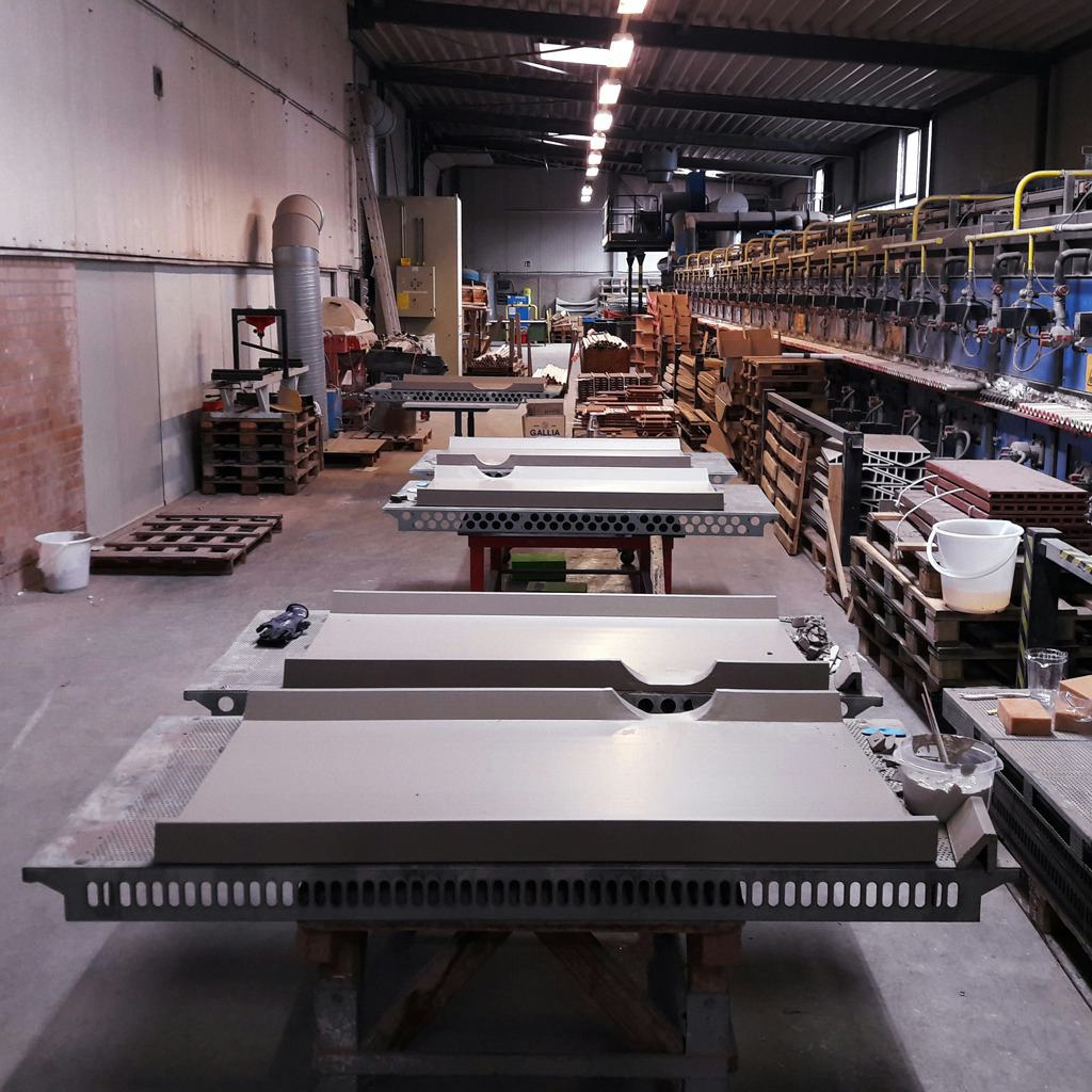 Large ceramic tiles being made in a factory