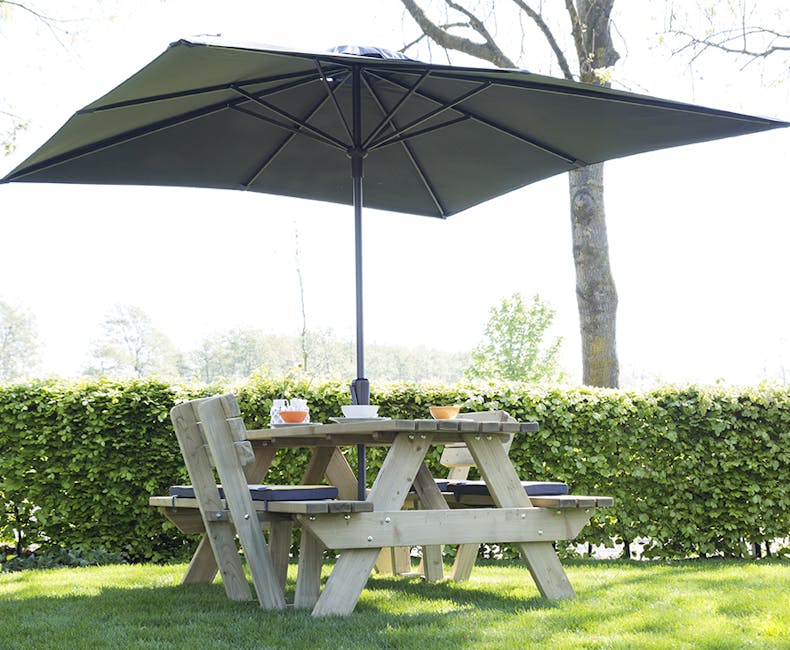 wooden picnic table with parasol