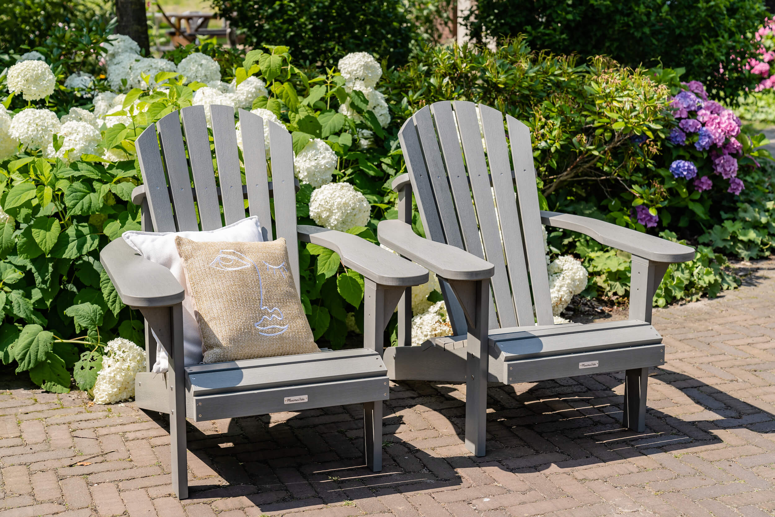 MaximaVida kunststof adirondack tuinstoel Montreal grijs bij hortensia