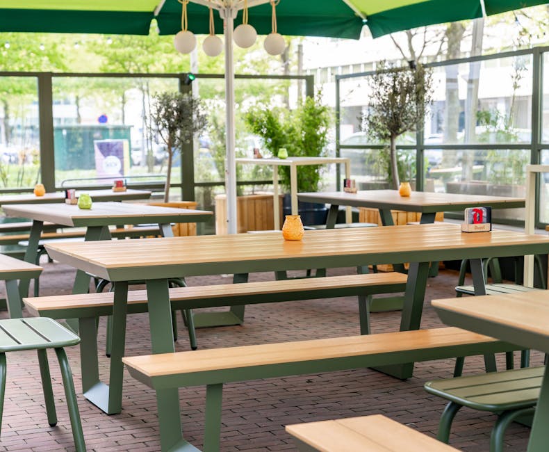 Olijfgroene Bermuda picknicktafel op het terras van House of Watt