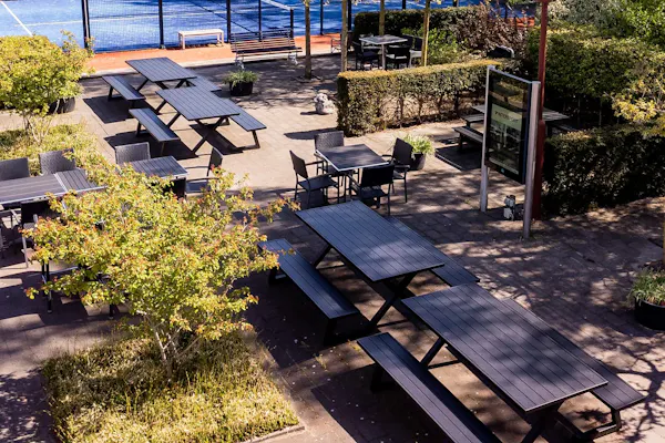 Aluminium picnic tables on a sports club terrace