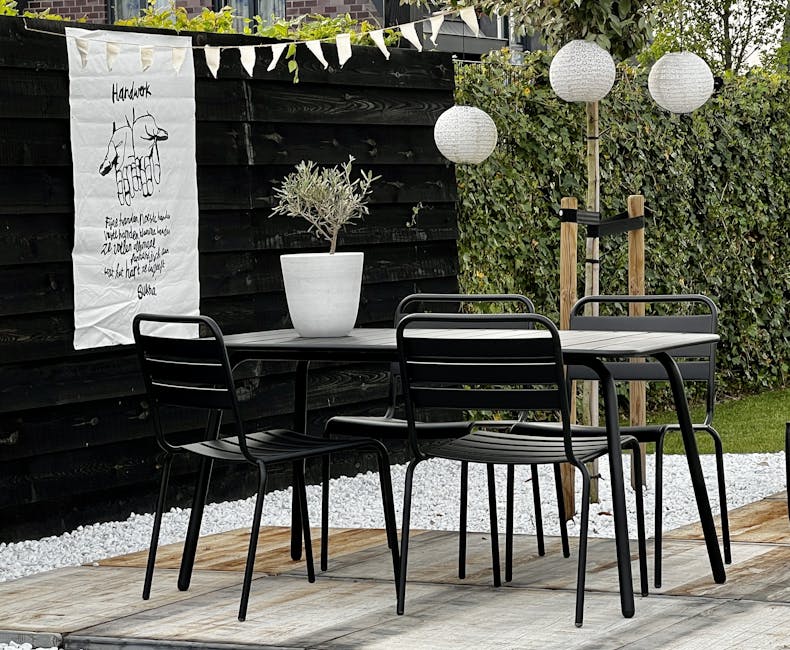 Max metal garden furniture set in black in the back garden