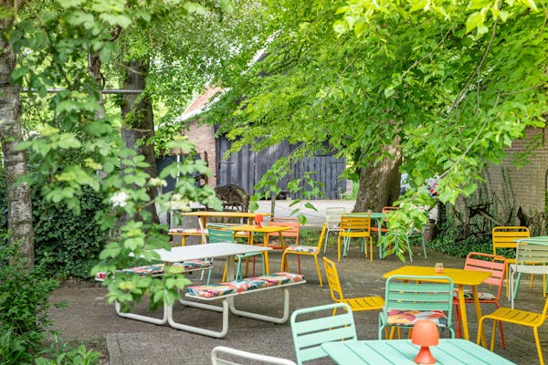 Coloured Max garden furniture with cushions in tea garden Rensink