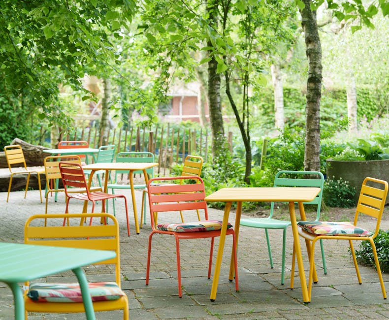Coloured Max chairs with cushions on the terrace of the Rensink tea garden