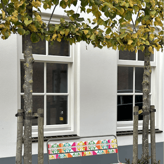 Metal Max garden bench with printed stickers