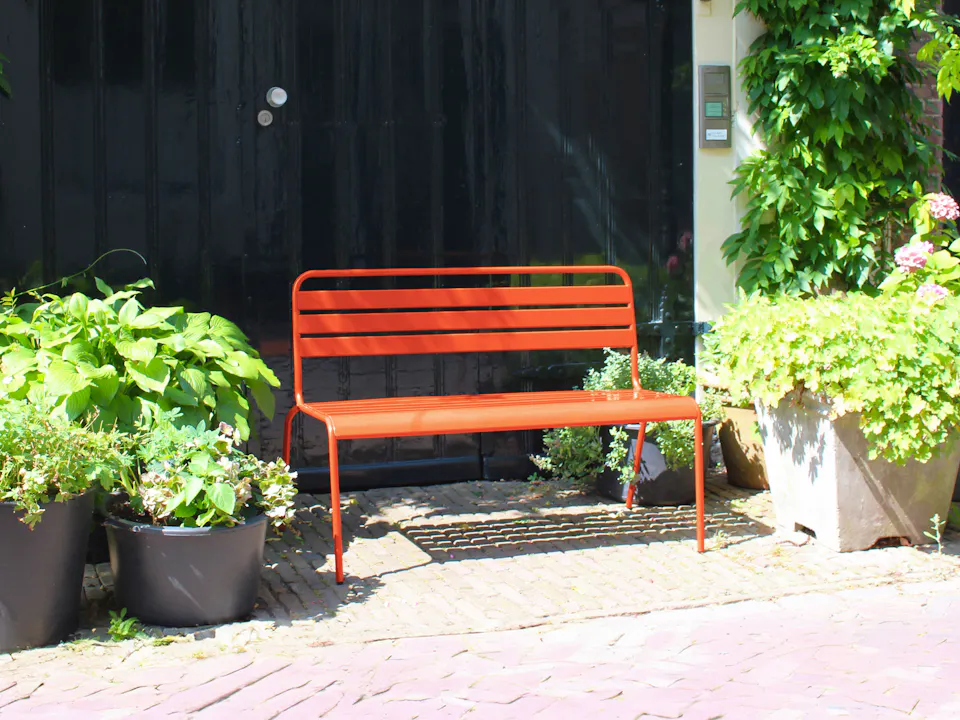 Orange metal garden bench Max