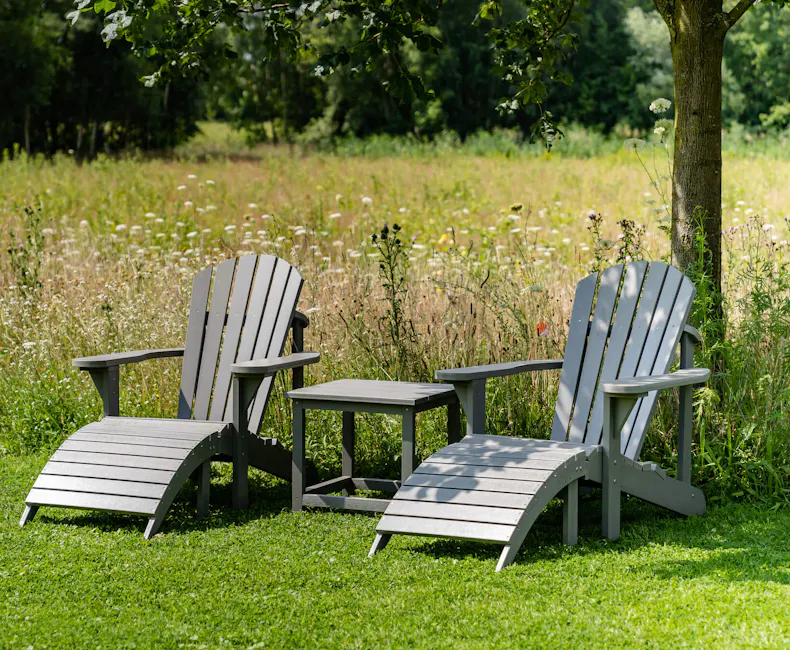 Grey Montreal Adirondack chair in the garden