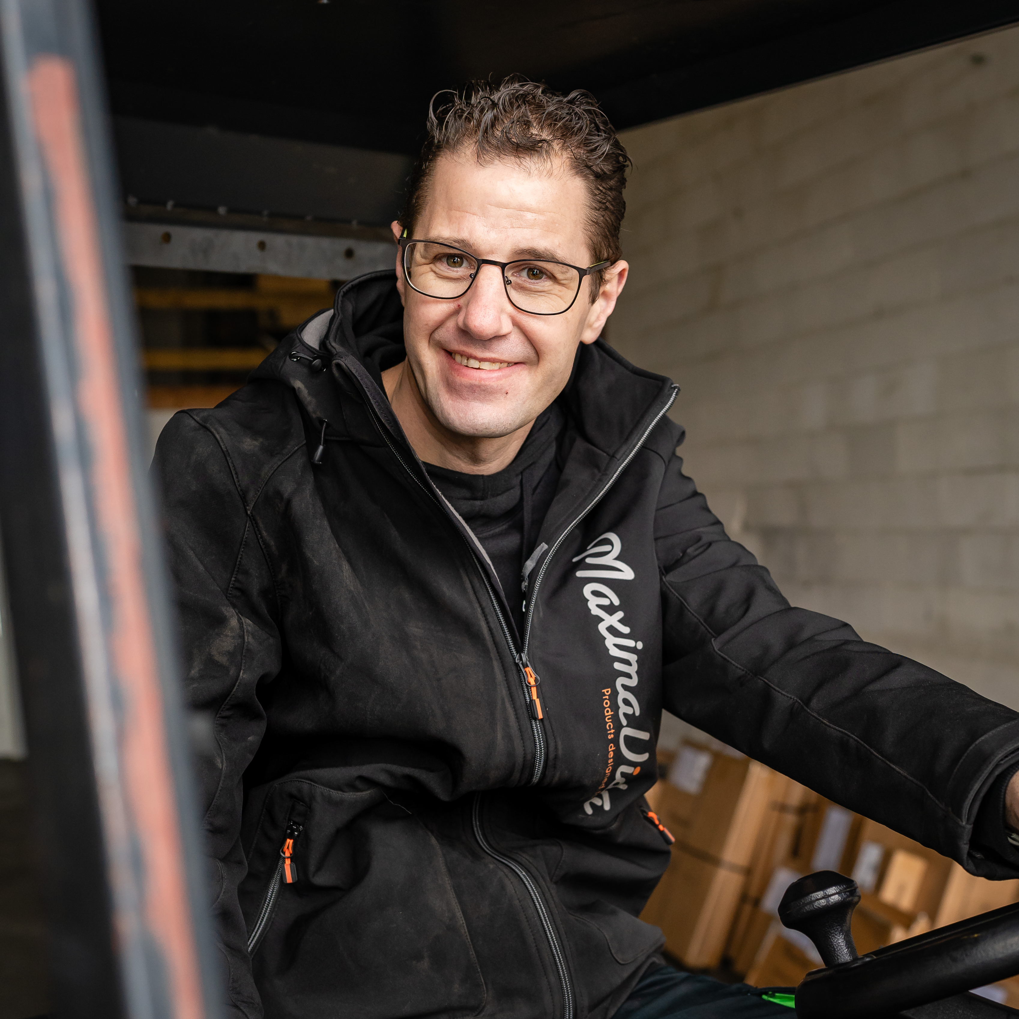 André op de heftruck