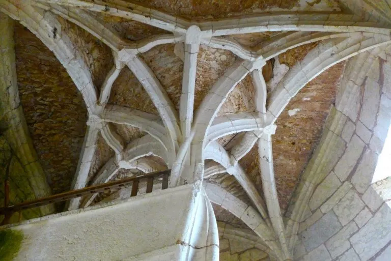 Stunning stone palm at top of central stone spiral staircase
