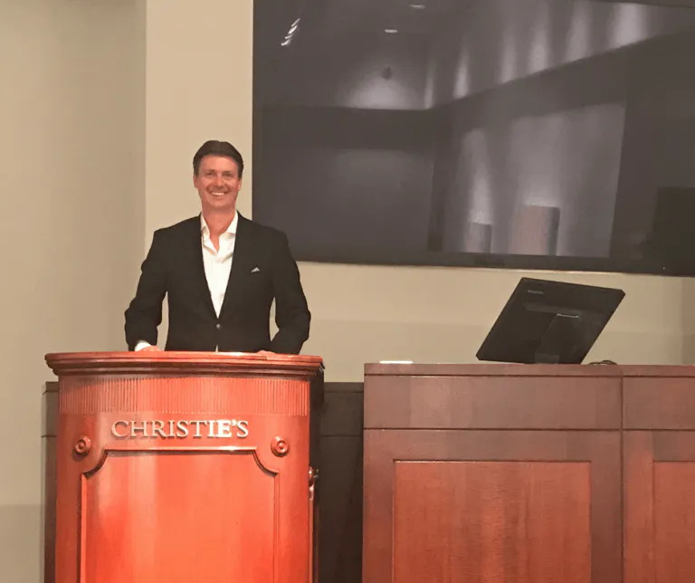 Michael Baynes (Maxwell-Baynes) on the podium at Christie's International Real Estate, New York