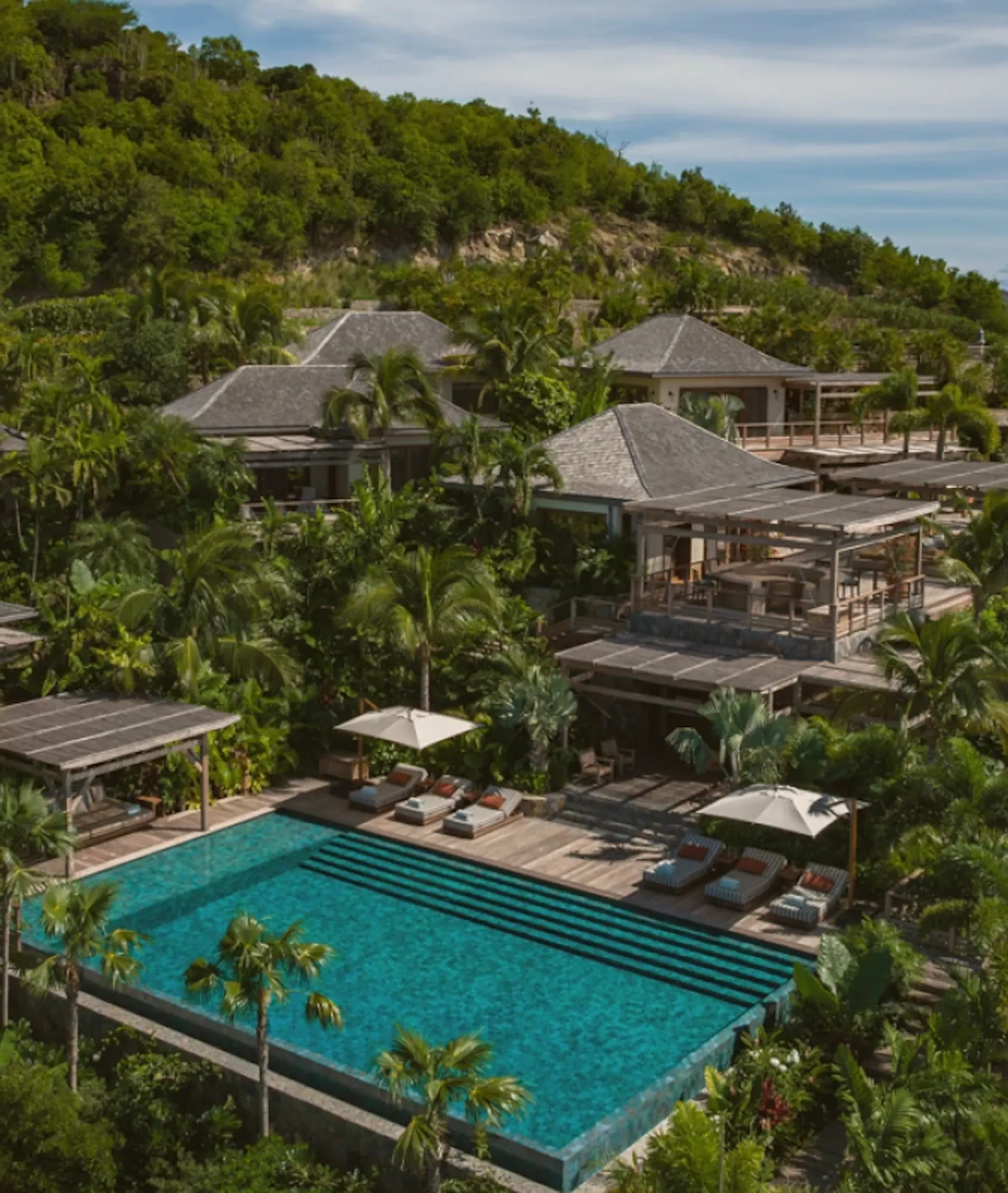 Photo of a villa with a pool.
